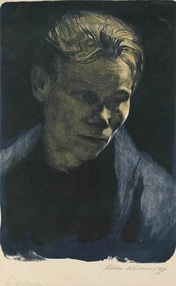 Portrait of a woman in blue shawl looking downward