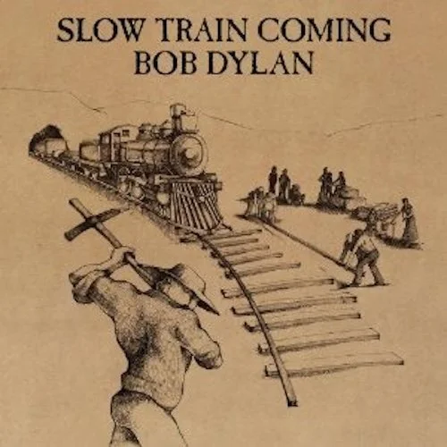 A black line drawing on brown of men building a railroad with a train riding on it toward the viewer