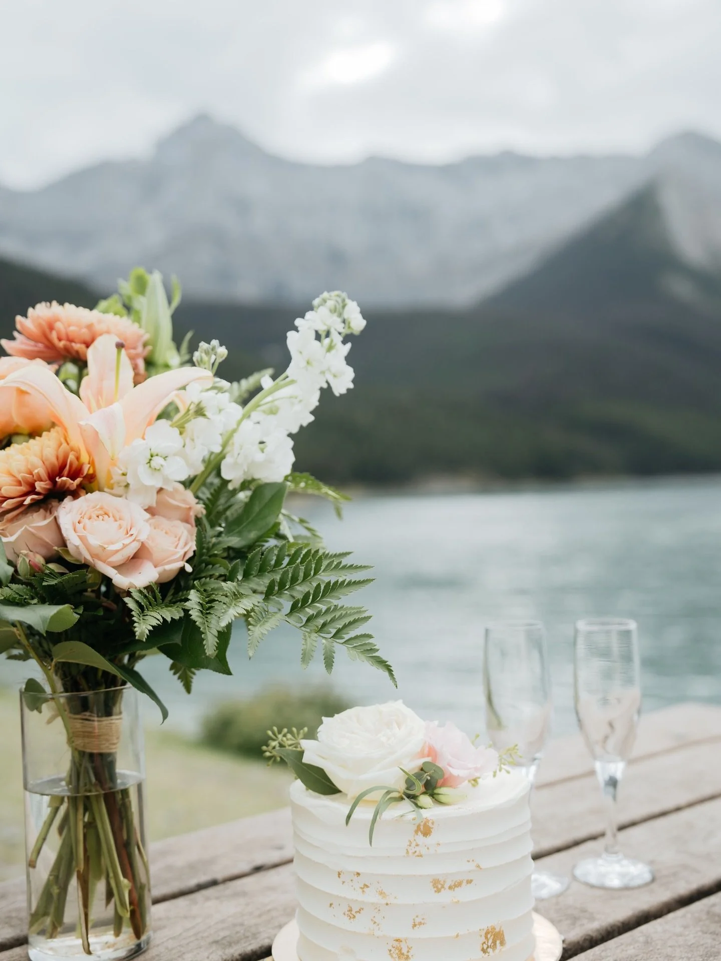Just a friendly reminder you can celebrate your wedding by having cake and champagne in the mountains.