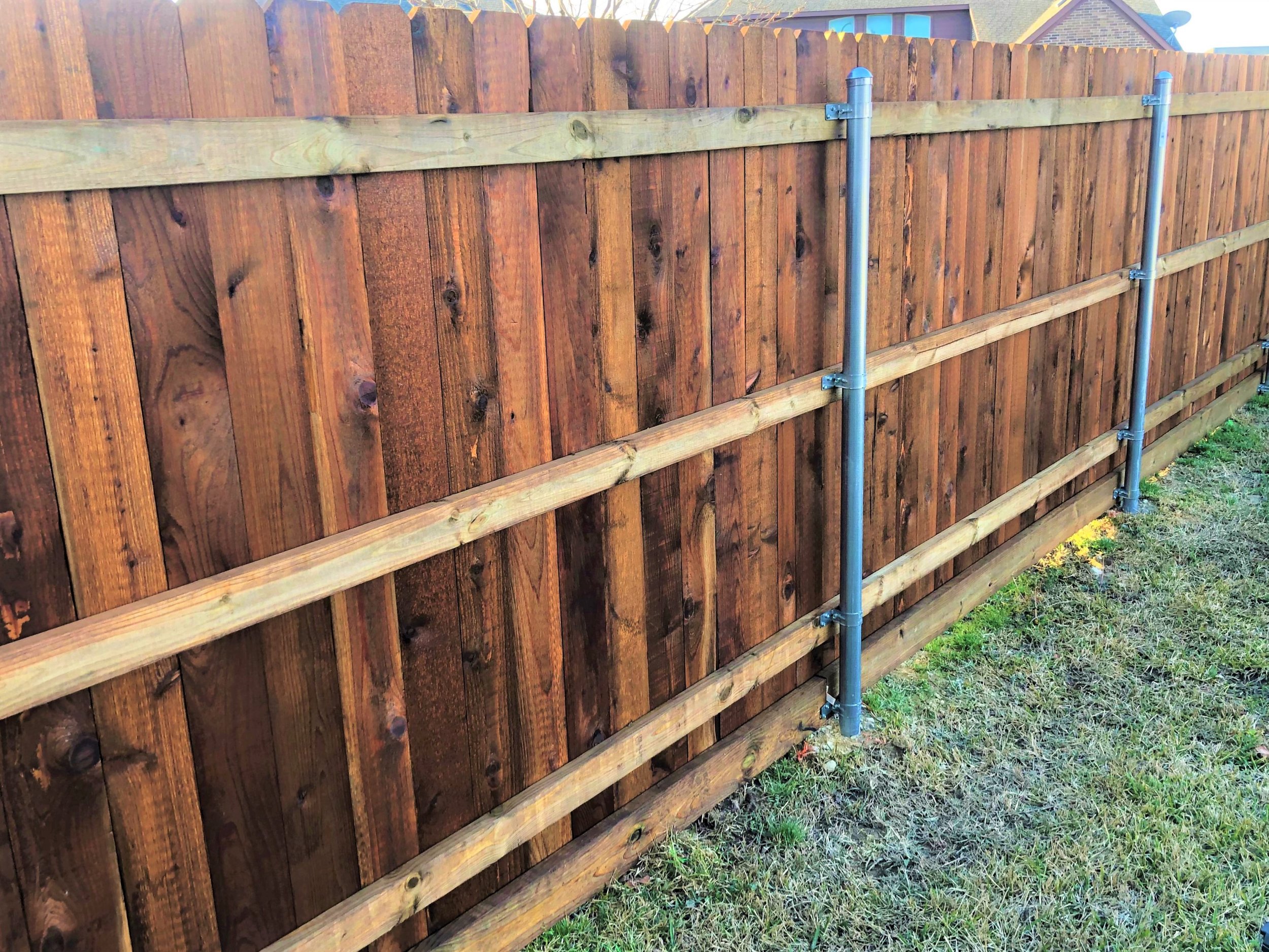 Residential Back of Pre-stained Dog Ear Cedar Fence.JPG