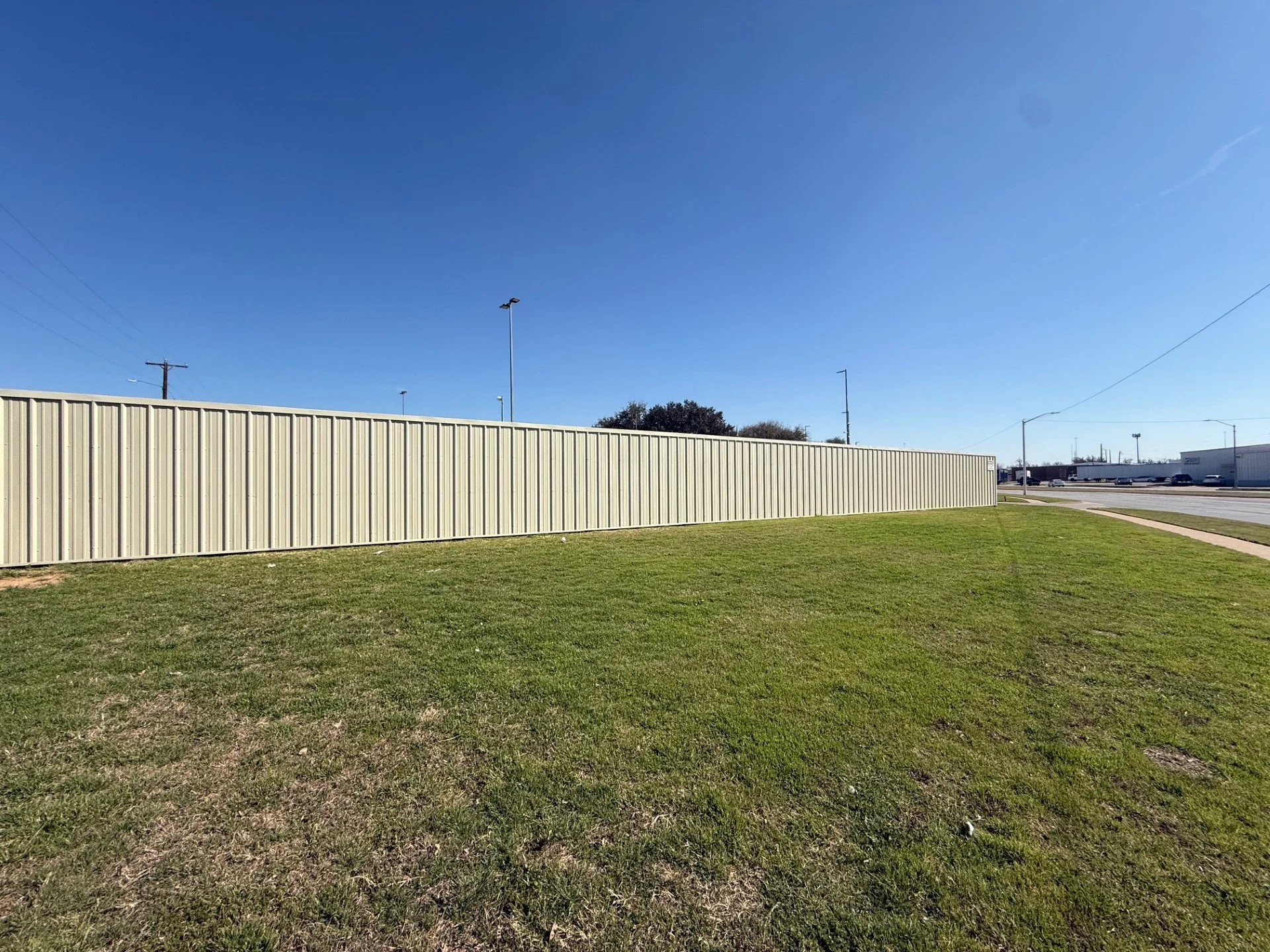 Commercial R-panel fence line.jpg