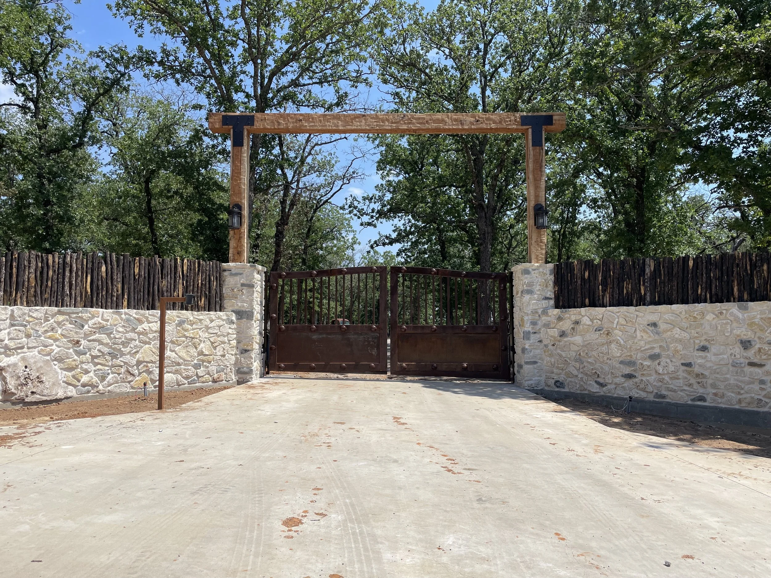 Stone-Entry-Custom-Iron-Gate-Wood-Header.JPG