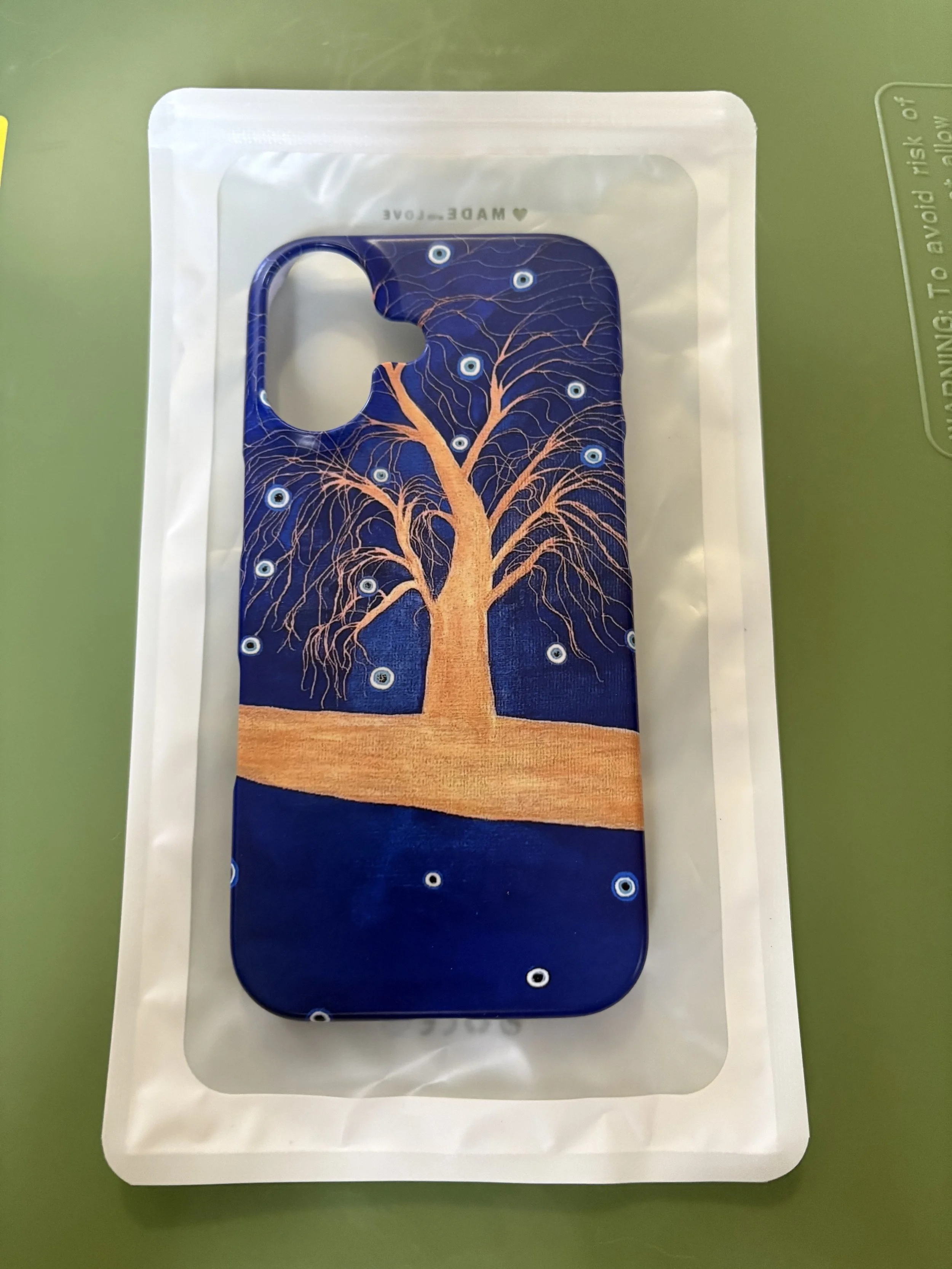 Evil eye tree iPhone case