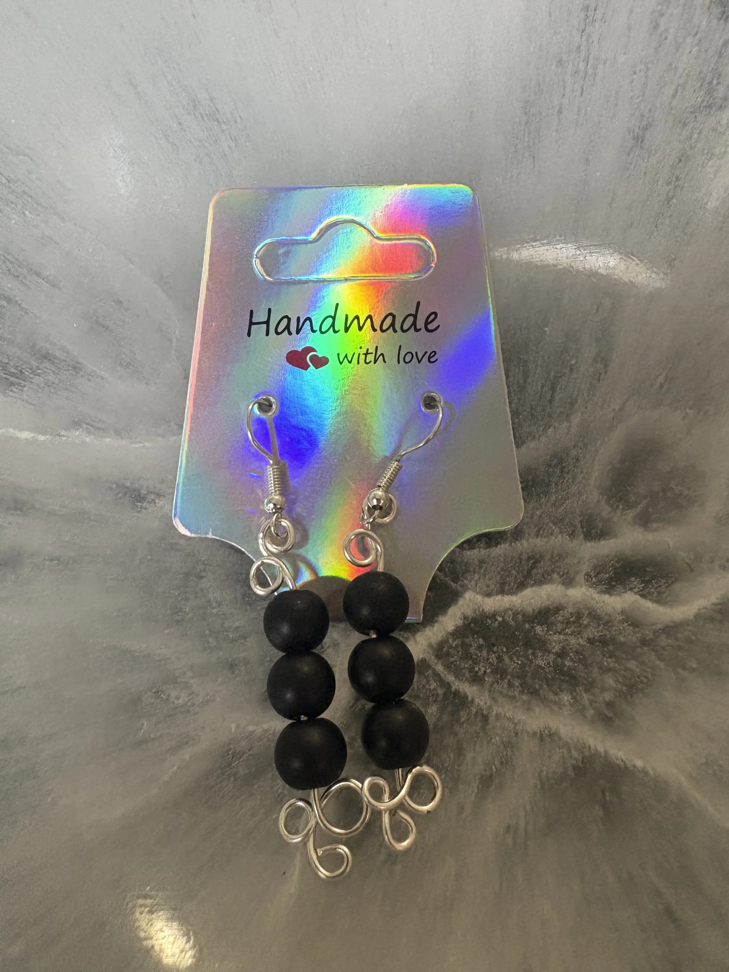 dangling silver and black wire earrings