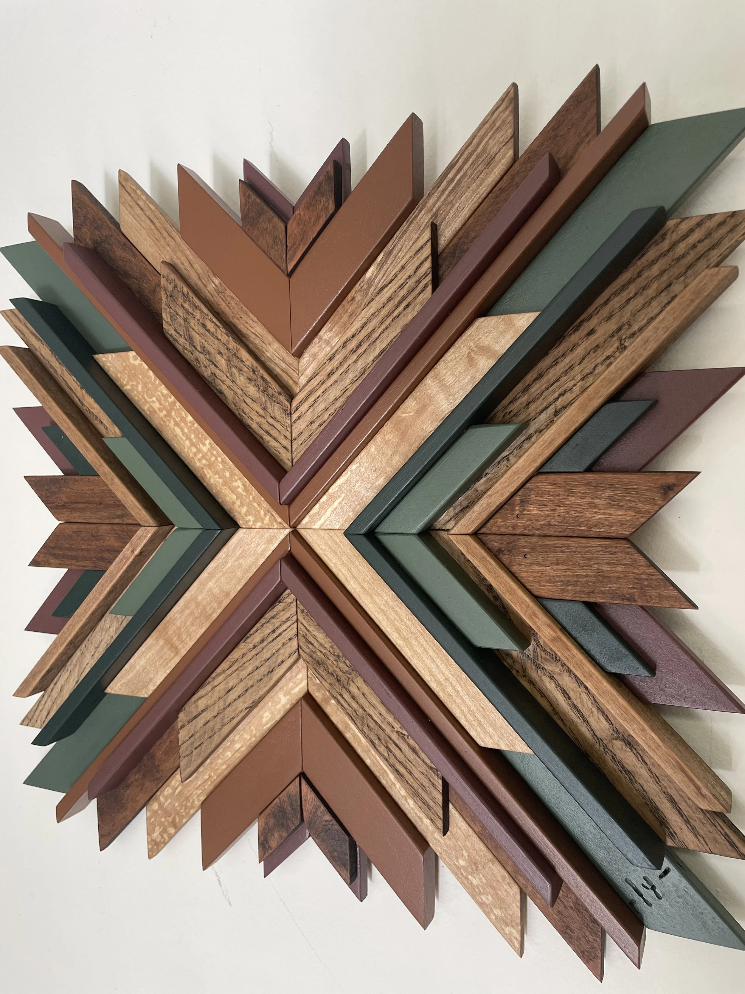 Angled view of design option two for a custom small sunburst style wooden mosaic.