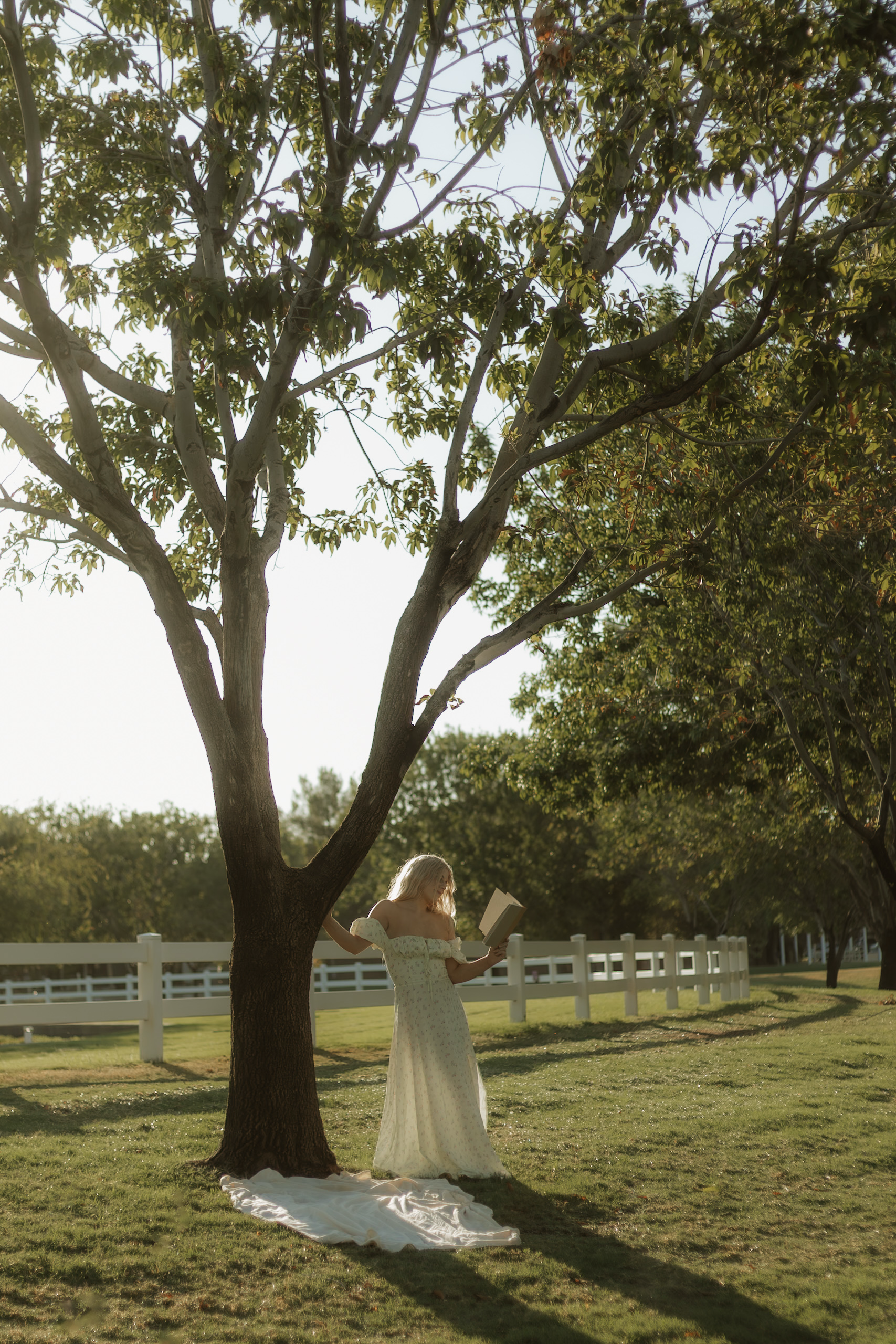 Stand tall, holding the tree while reading your favorite book