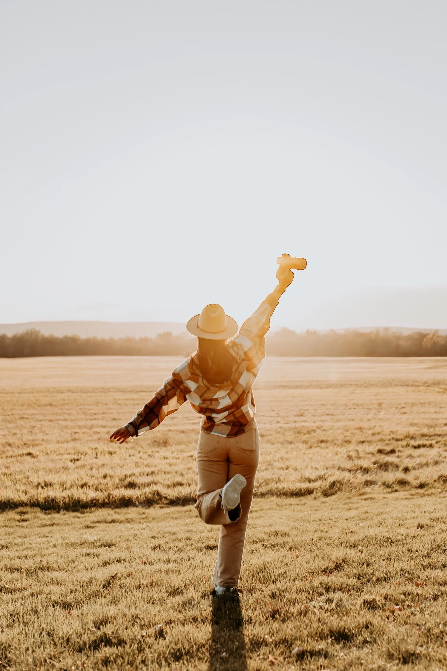 airplane arms, hold your book on your right arm, while standing on one leg and kick the other one back