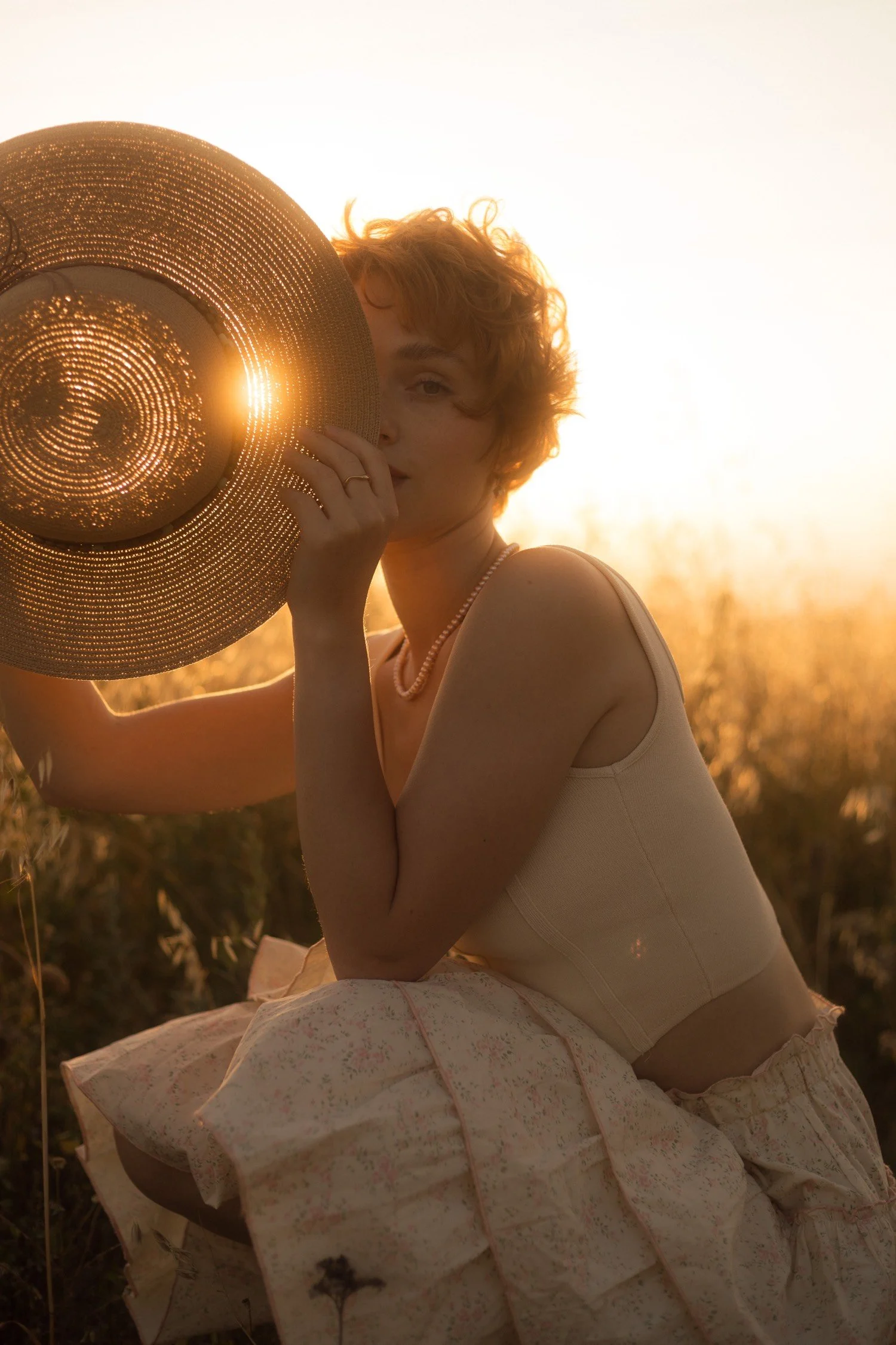 Hold the book against one eye, so that it cover about one half of your face