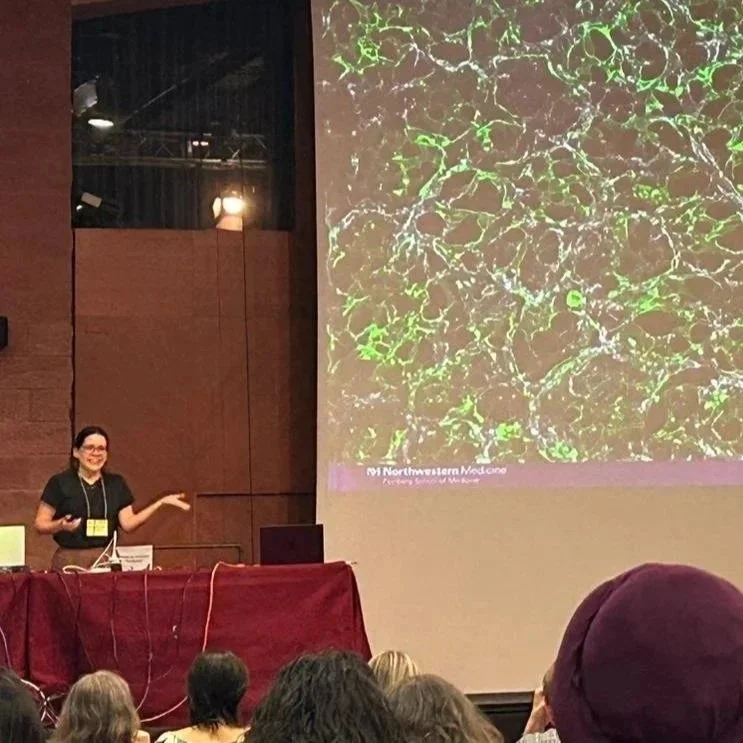 Lisandra giving a talk at the lung GRC 2025 in Italy