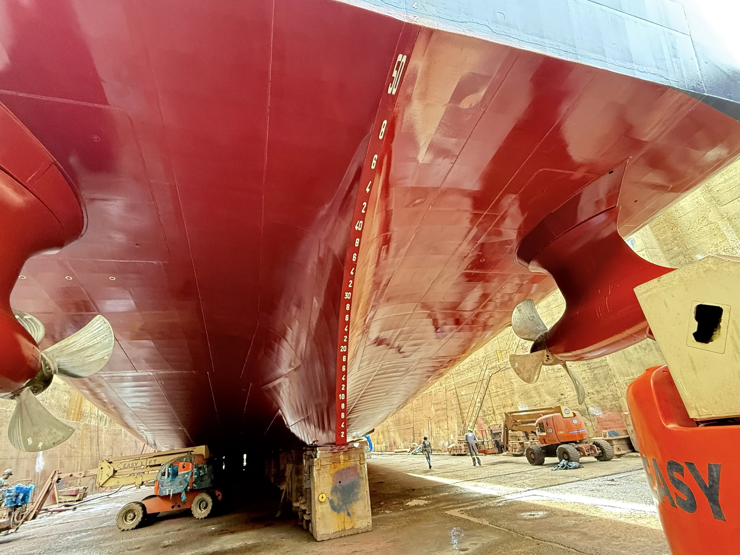 Large vessel in drydock — Sea-Speed hull coating