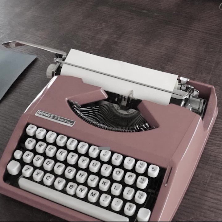 A vintage orange typewriter