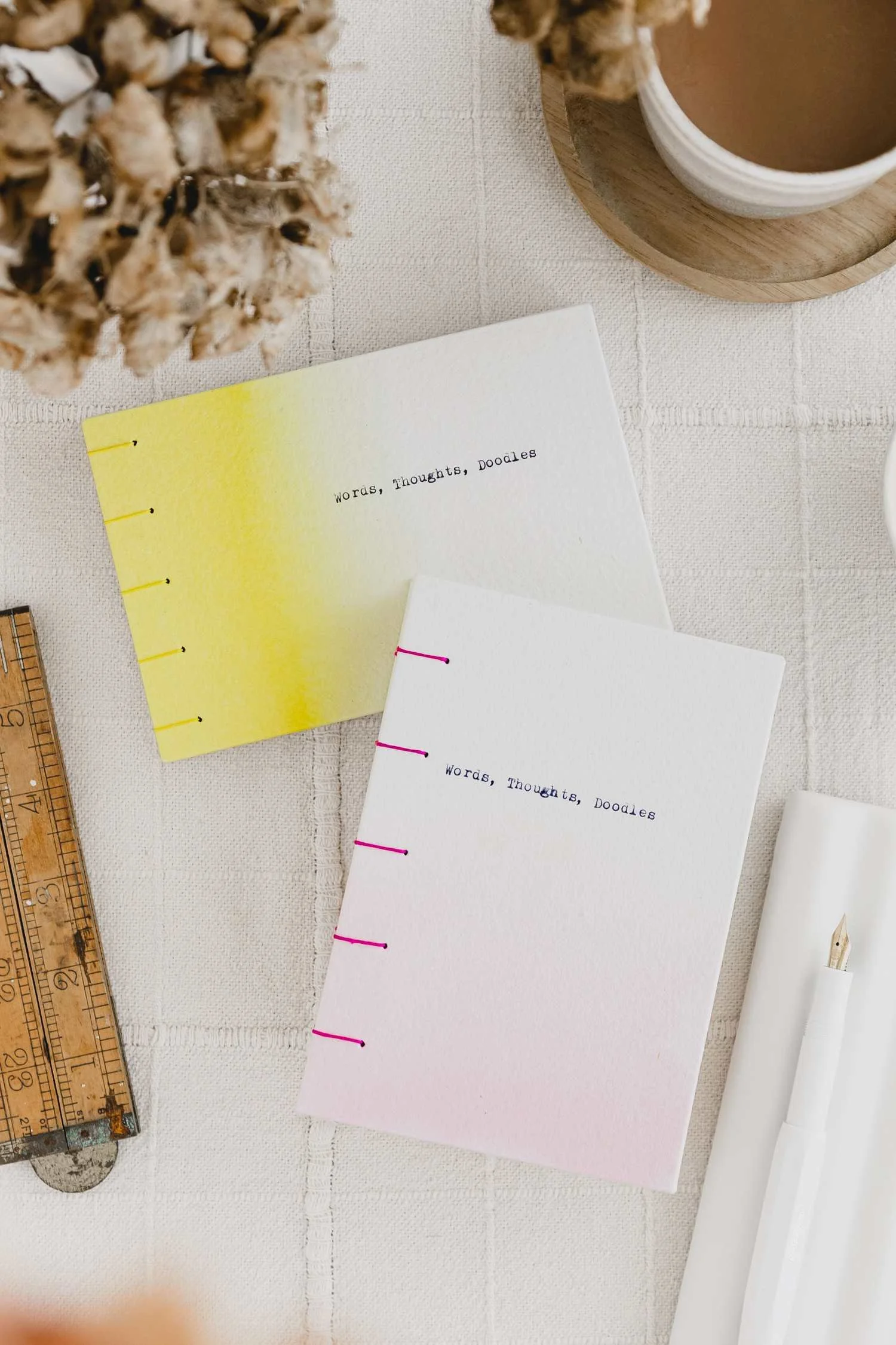 2 handstched journal with an ombre design in yellow and pink