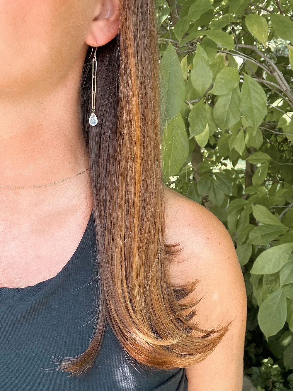 Chain link linear with Moonstone drop.