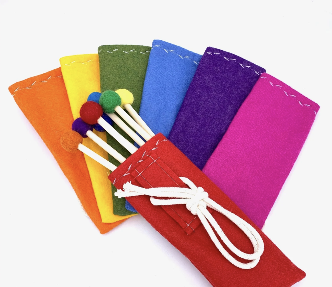 Colorful felt pouches with xylophone mallets