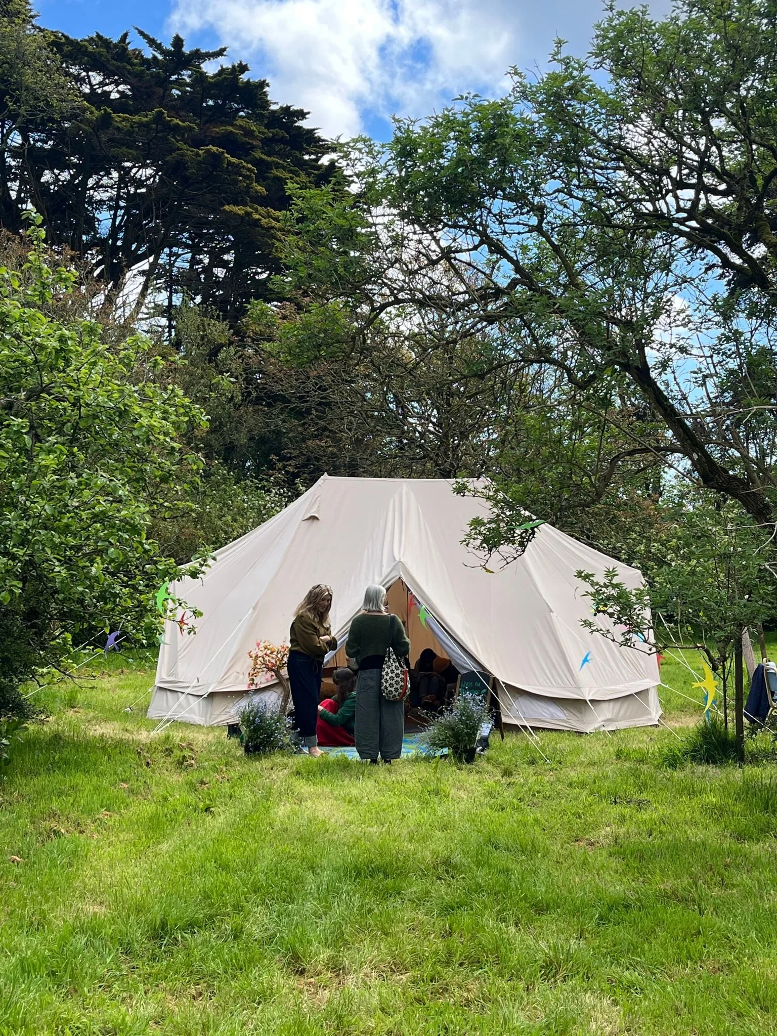 People outside looking in -The Poetry Tent, where Rosie, our Poet in Residence shared, recited and encouraged poems and poem-writing all day.
