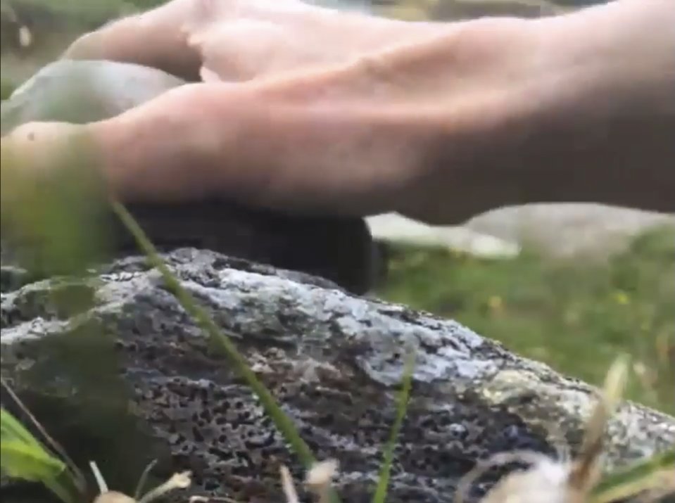 Making an impression of the rock texture in clay to show people at a distance