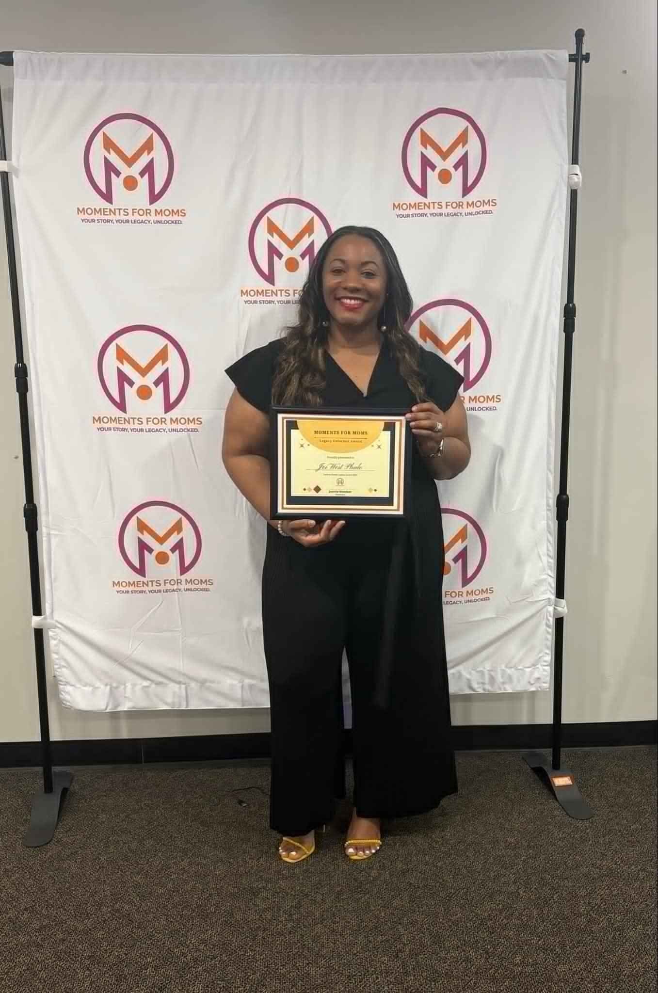 Joi received the Moments for Moms Legacy Unlocked Award : Faith & Family Legacy in 2025.