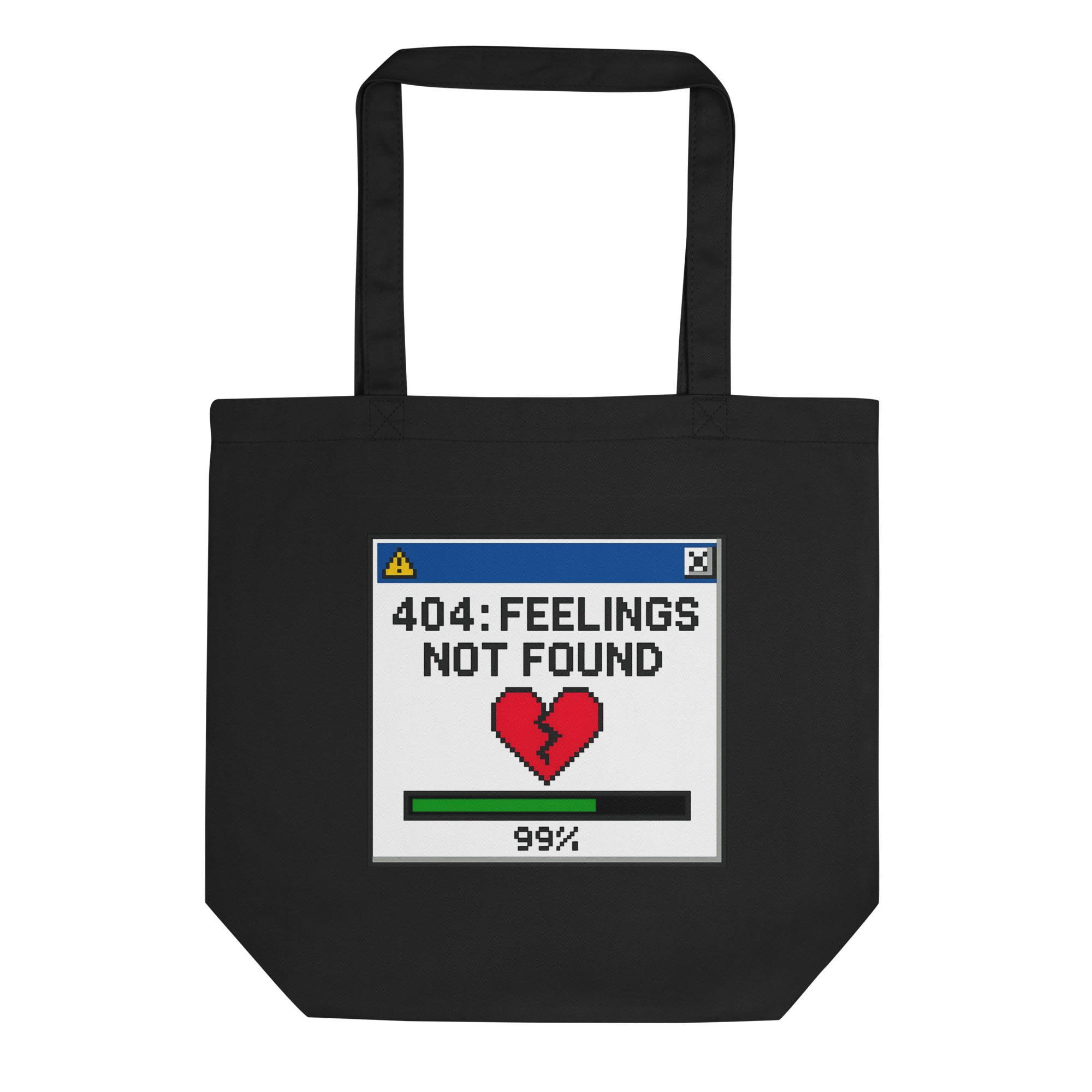 Black organic tote bag with pixel art reading “404: Feelings Not Found” and a red broken heart icon. Y2K computer window graphic.