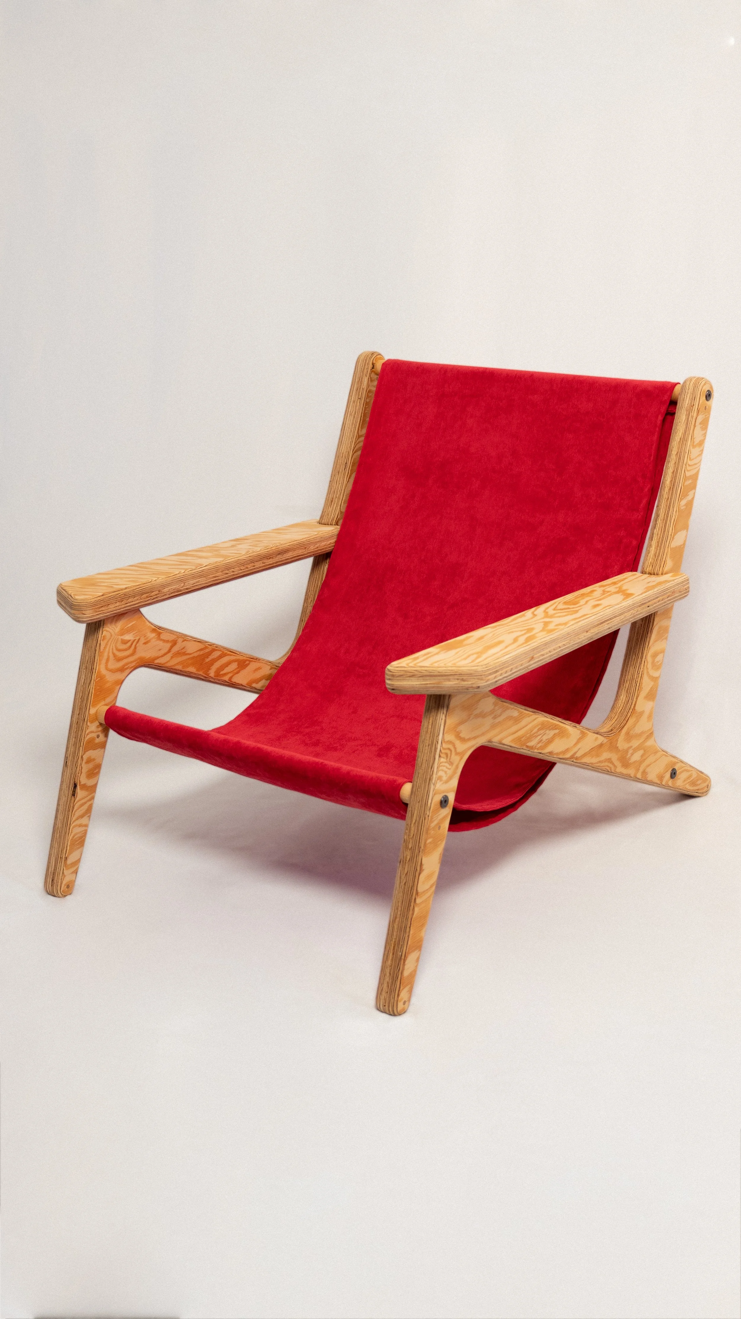 Lo.

Lo. is a boho sculptural plywood lounge chair designed and fabricated in-house in the Yukon, Canada using CNC precision and layered construction. Built from high-grade plywood and shaped with soft, rounded edges, it balances structural strength 