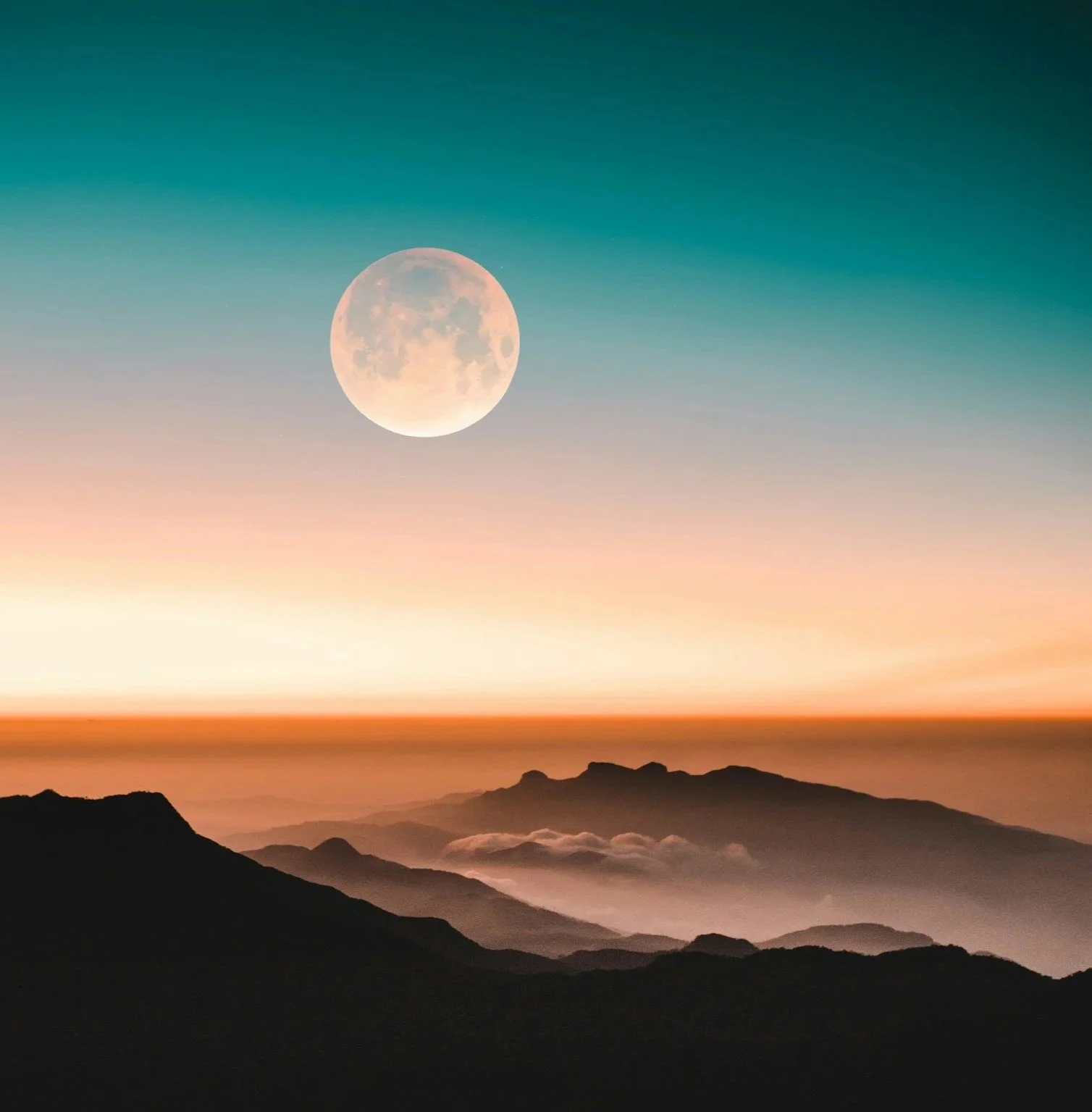 Full moon above layered mountain silhouettes at sunset, with a teal-to-orange twilight sky