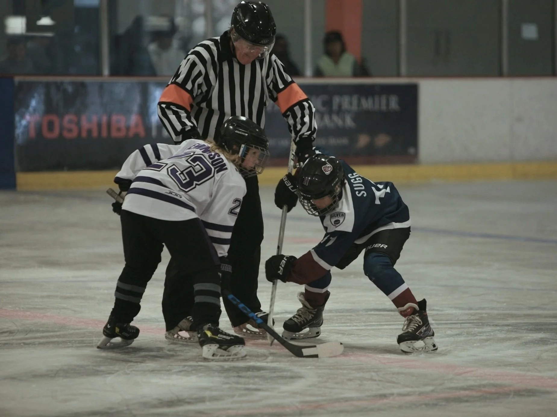 Avalanche youth hockey game action