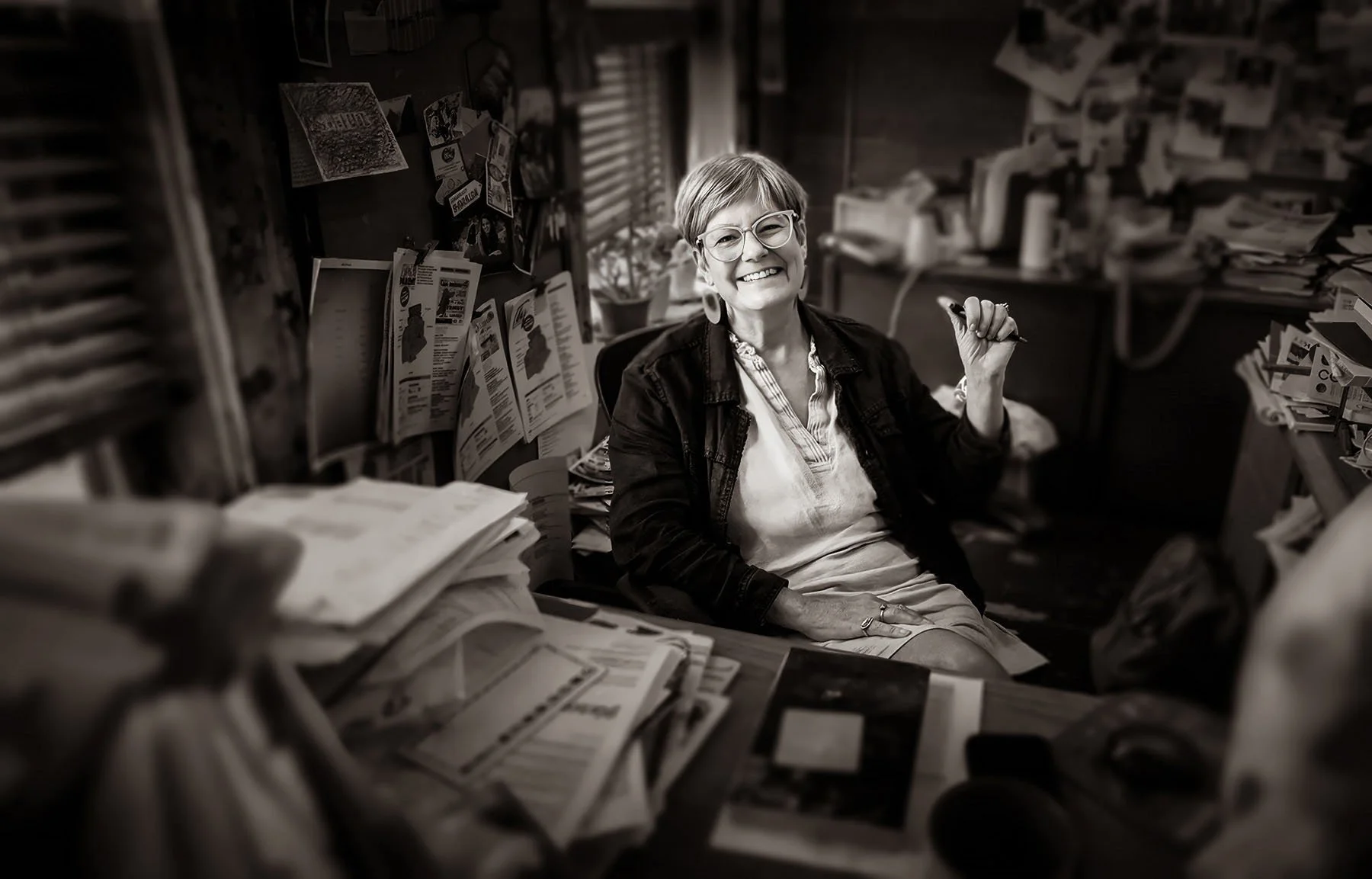 Editor at desk portrait by Pugliano Lansing Photographer.jpg