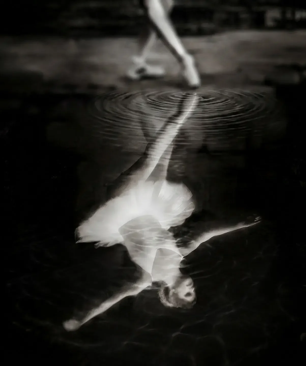 Ballerina reflected in water fine art portrait.webp