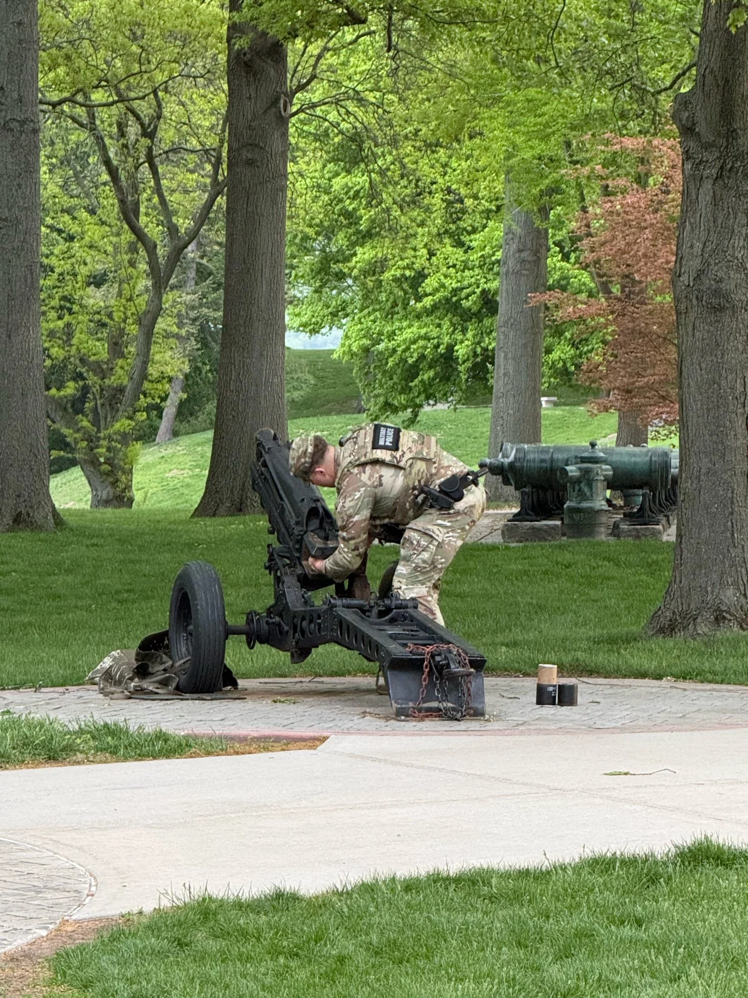 A West Point cadet loading up the canon to fire off the morning blast at 6am.