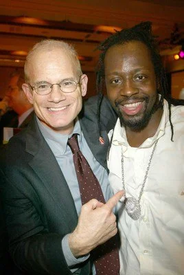 Wyclef Jean presents Bill Roedy with Youth AIDS Corporate Citizenship Award