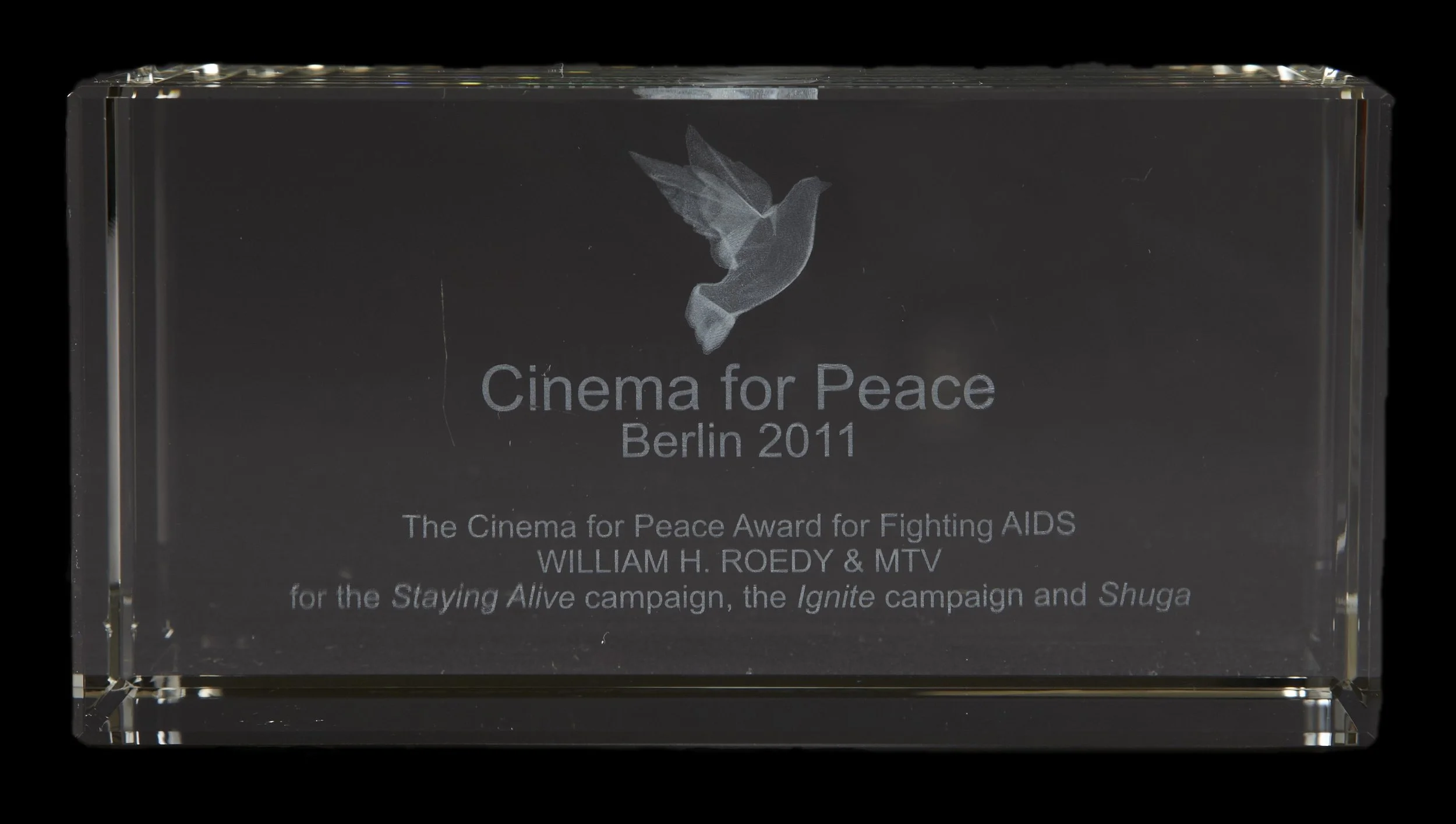 2011 Cinema for Peace Award presented to Bill during the Berlin Film Festival, for fighting HIV/AIDS through the Staying Alive Campaign by Lupita Nyong’o of the series Shuga.
