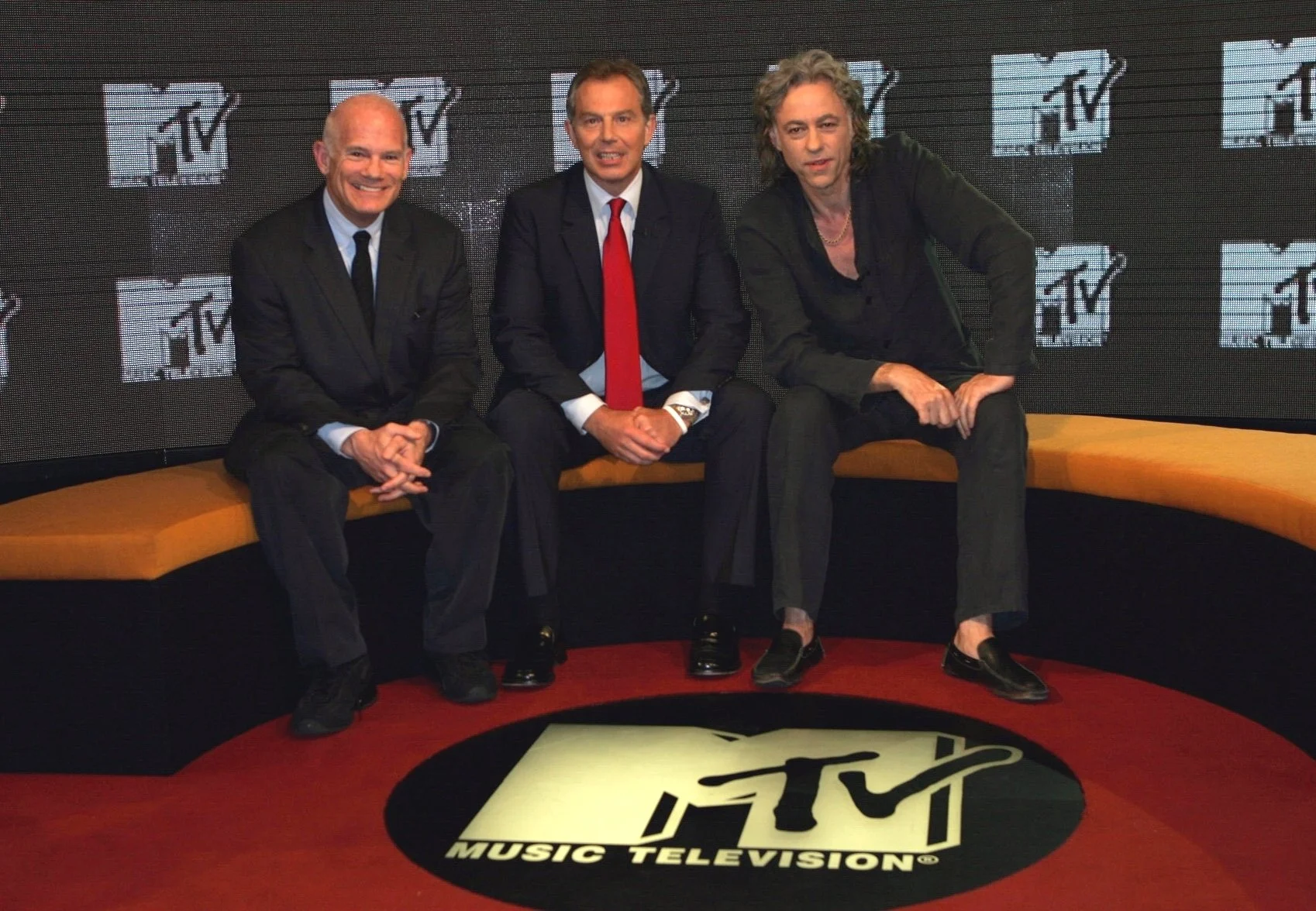with singer/activist Bob Geldof and then Prime Minister of the UK Tony Blair