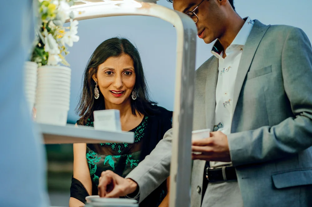 Wedding guests enjoying soft-serve ice cream from the tuk-tuk