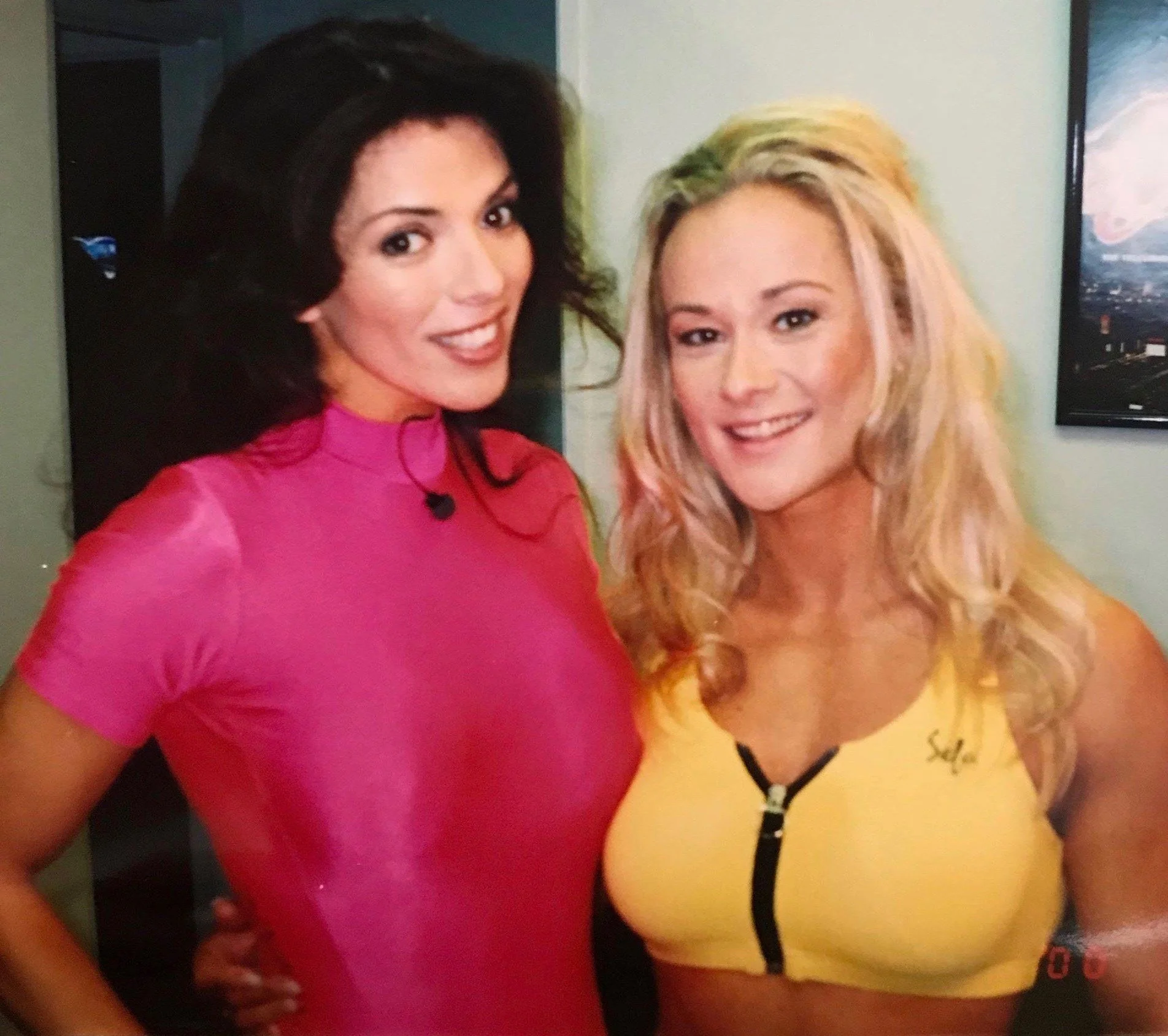 Sharon Bruneau and Lena Johannesen
I was hosting an Internet Show long before Podcasts and Blogs came along. I hired Lena and a few other Fitness Champs to join me for the workout segments. 
Unfortunately, Weider felt it was a conflict as I also feat