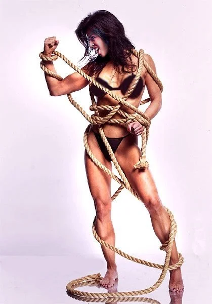 When booked for a Bill Dobbins Shoot and asked to bring my creative juices and artsy ideas ... Already know how to express myself thru posing so I show up with body tape and saran wrap. (Rope was in Bill's chest of props .. )