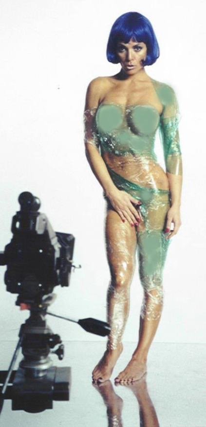 When booked for a Bill Dobbins Shoot and asked to bring my creative juices and artsy ideas ... Already know how to express myself thru posing so I show up with body tape and saran wrap. (Rope was in Bill's chest of props .. )