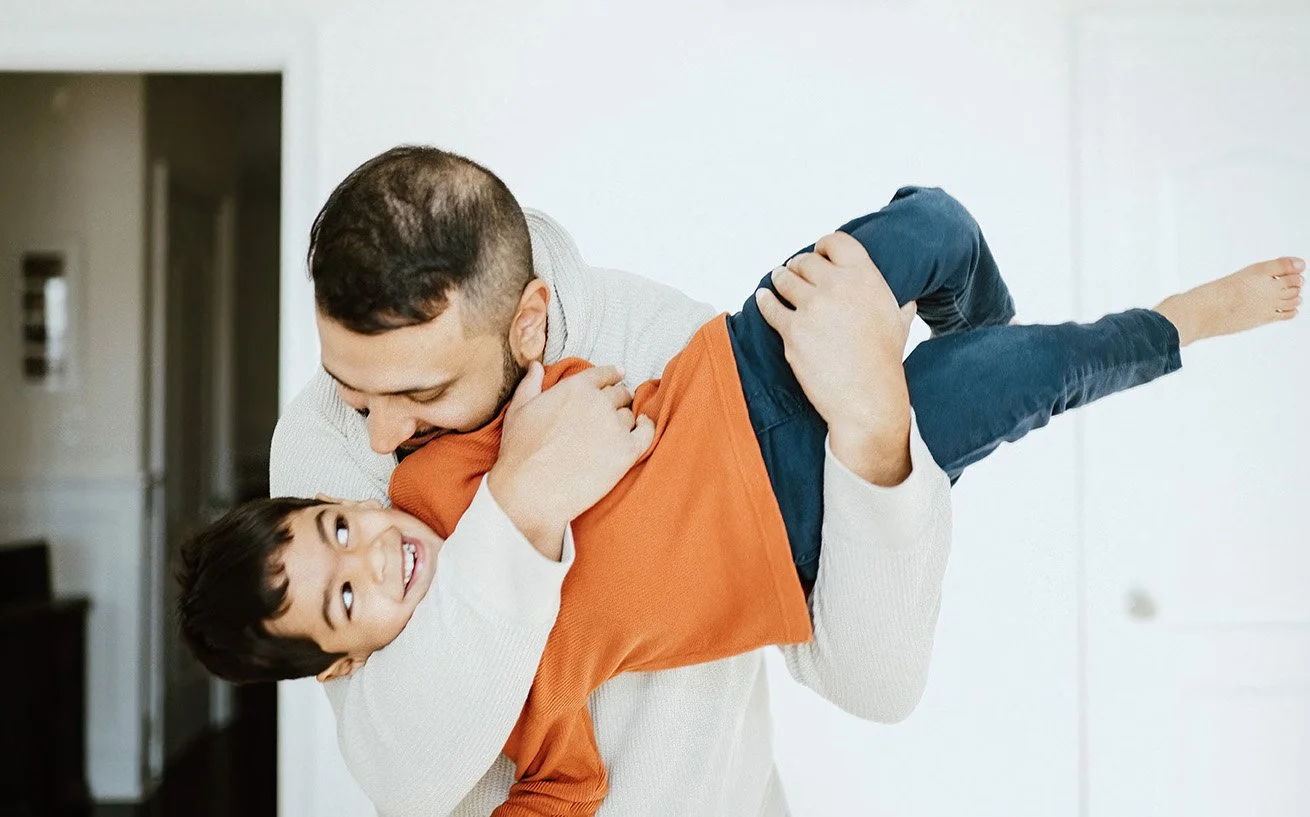 Dad and son indoor photo session taken on film