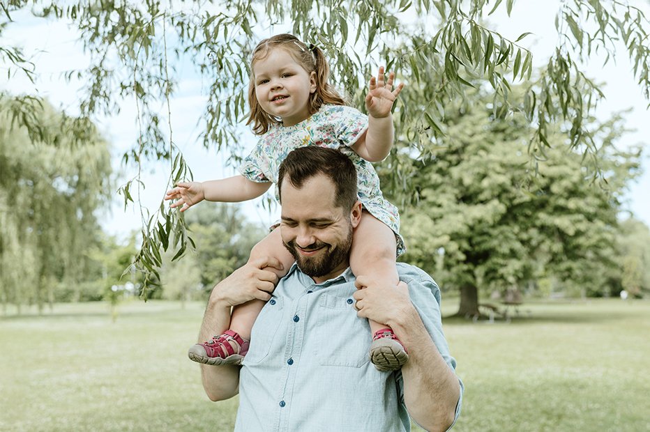 dad with daughter outdoor summer photo session on toronto island with film aesthetic