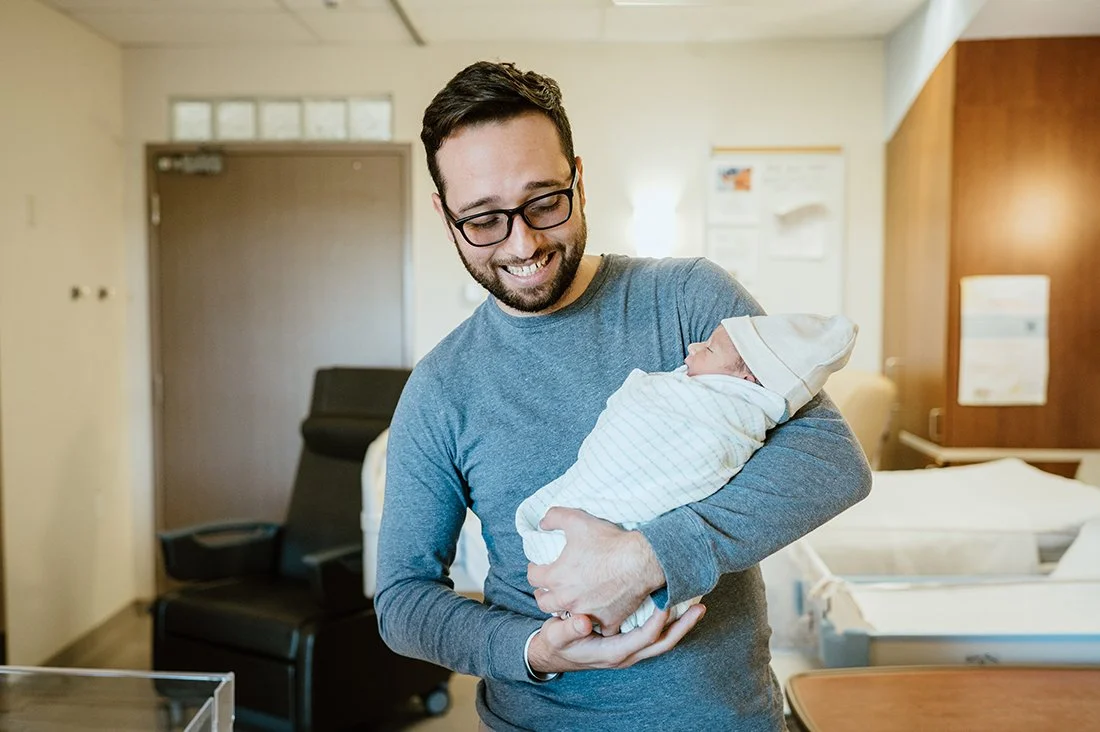 dad with newborn in toronto hospital