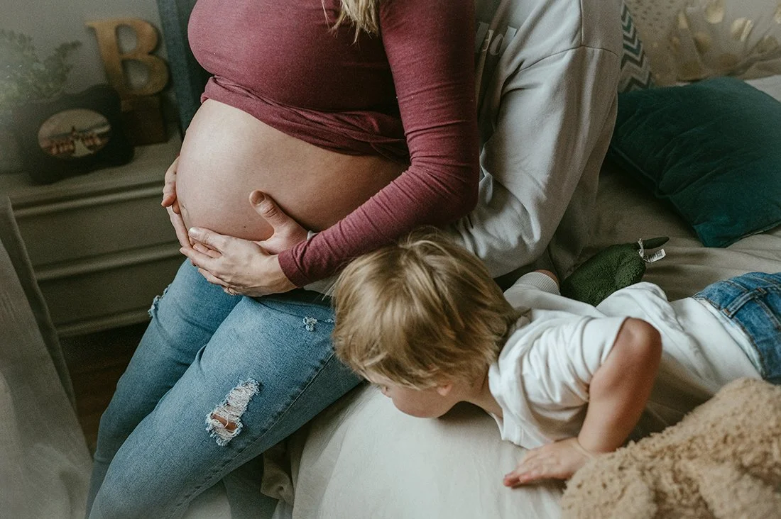 Maternity photography with brother at a home in toronto