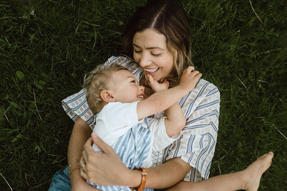 Candid film photo of mom and son along lakeshore park in toronto