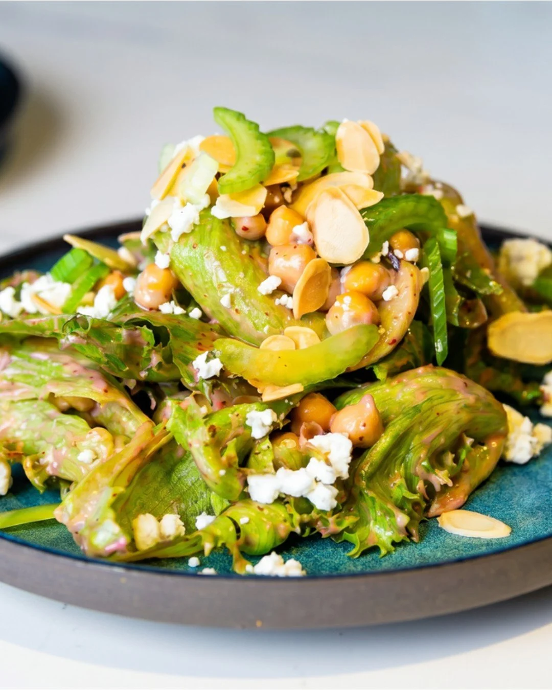This is your sign to order the salad.

MIXED GREEN SALAD | ch&egrave;vre, toasted almonds, celery, chickpeas, blueberry citrus vinaigrette