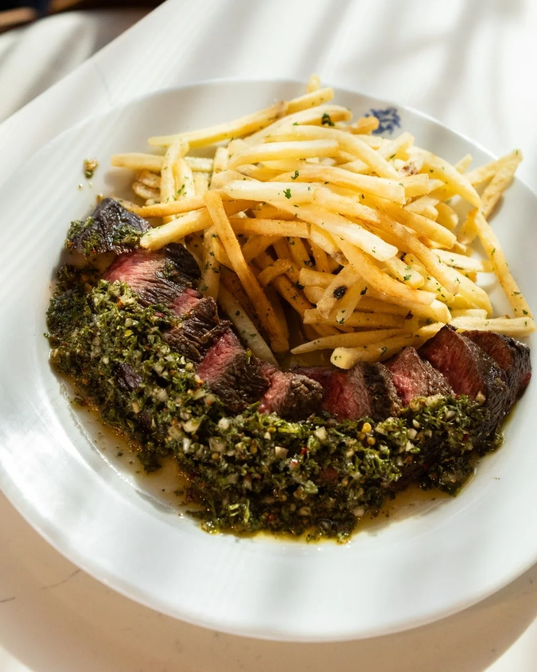 STEAK FRITES
10 oz. sliced denver steak, chimichurri, shoestring fries ... need we say more?