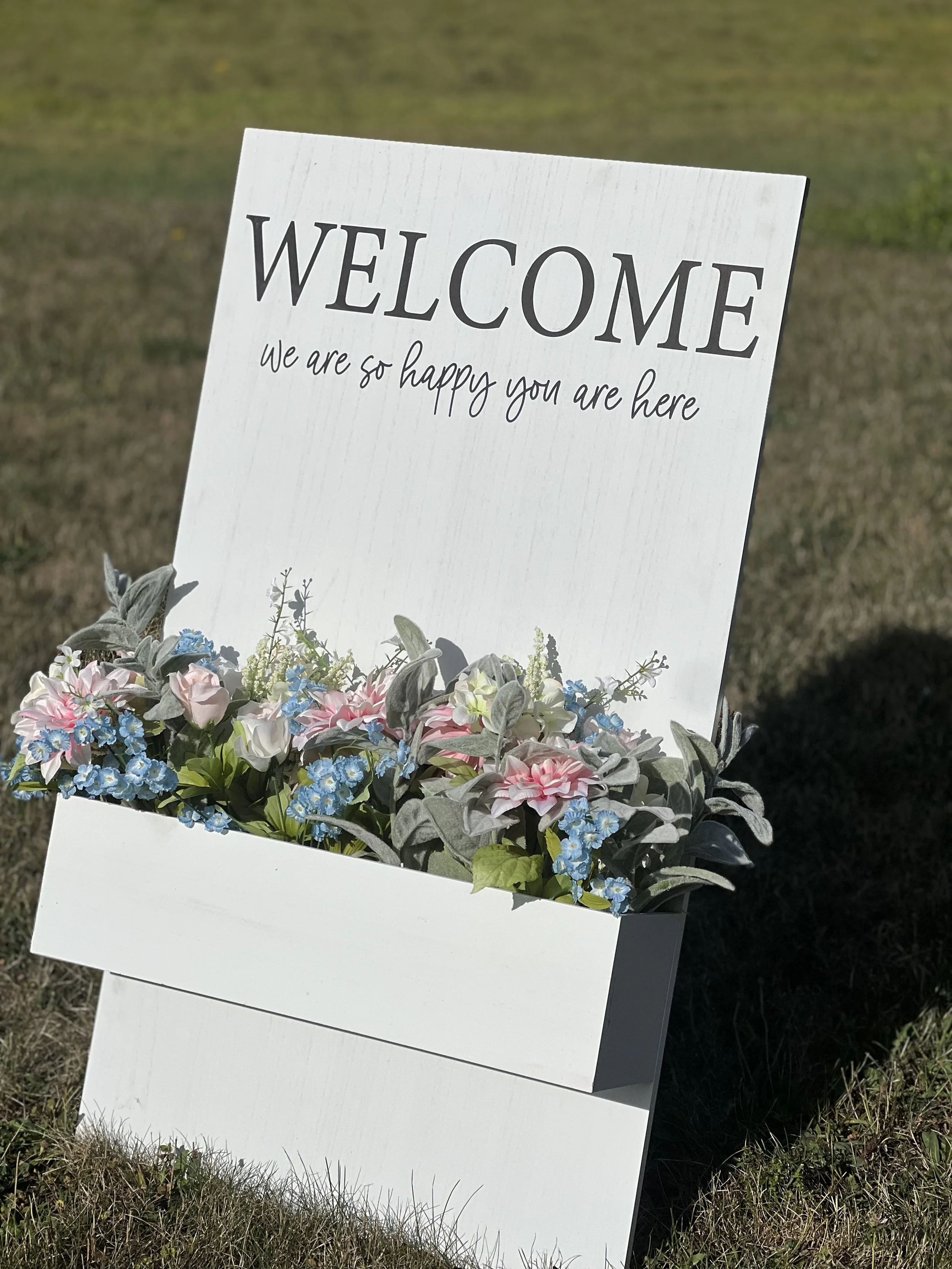 Welcome Sign with Flower Display
