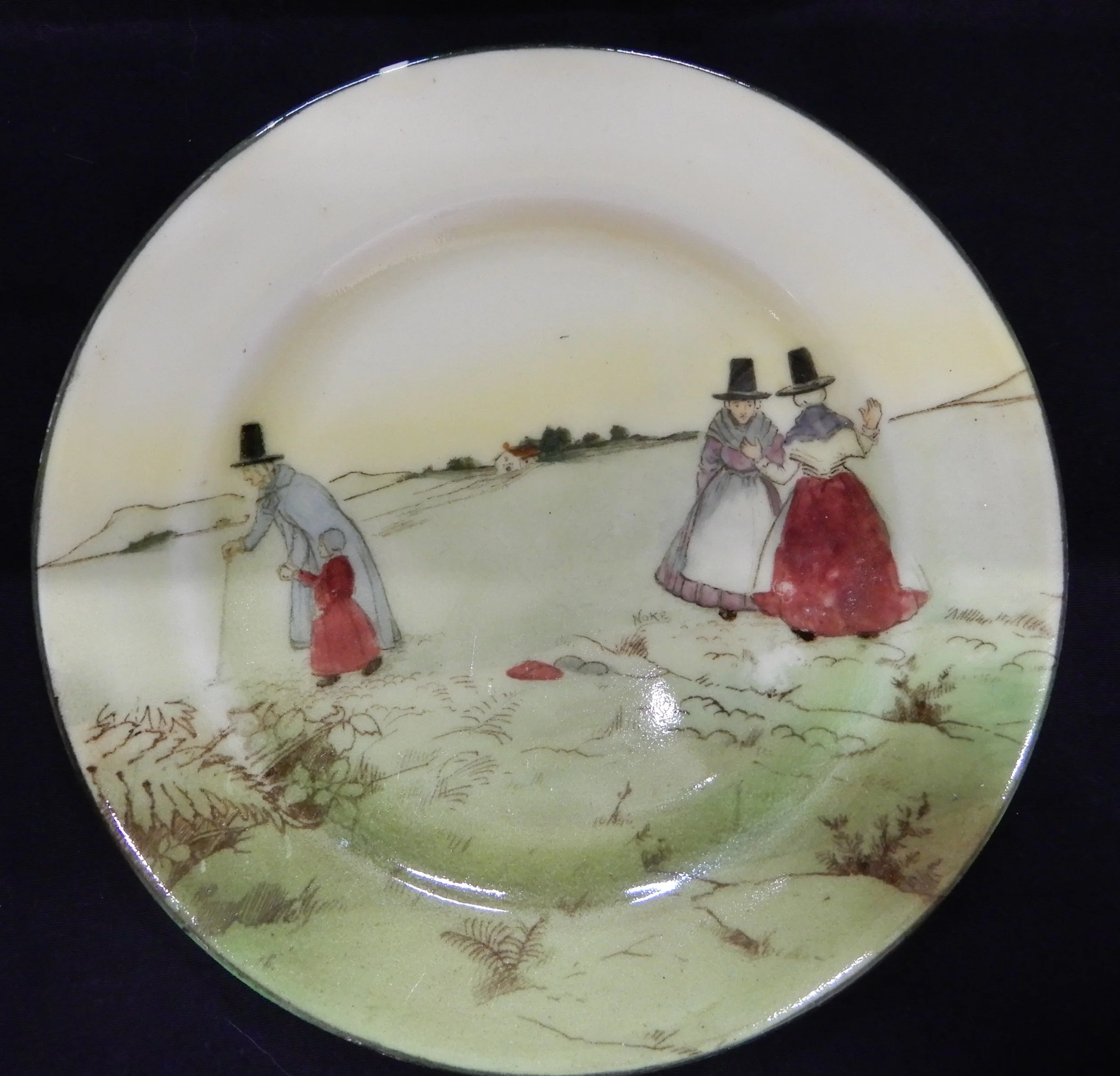 213. Mini plate Welsh ladies. Int 1906. Designer Noke. 13cms dia. Rare. $100.JPG