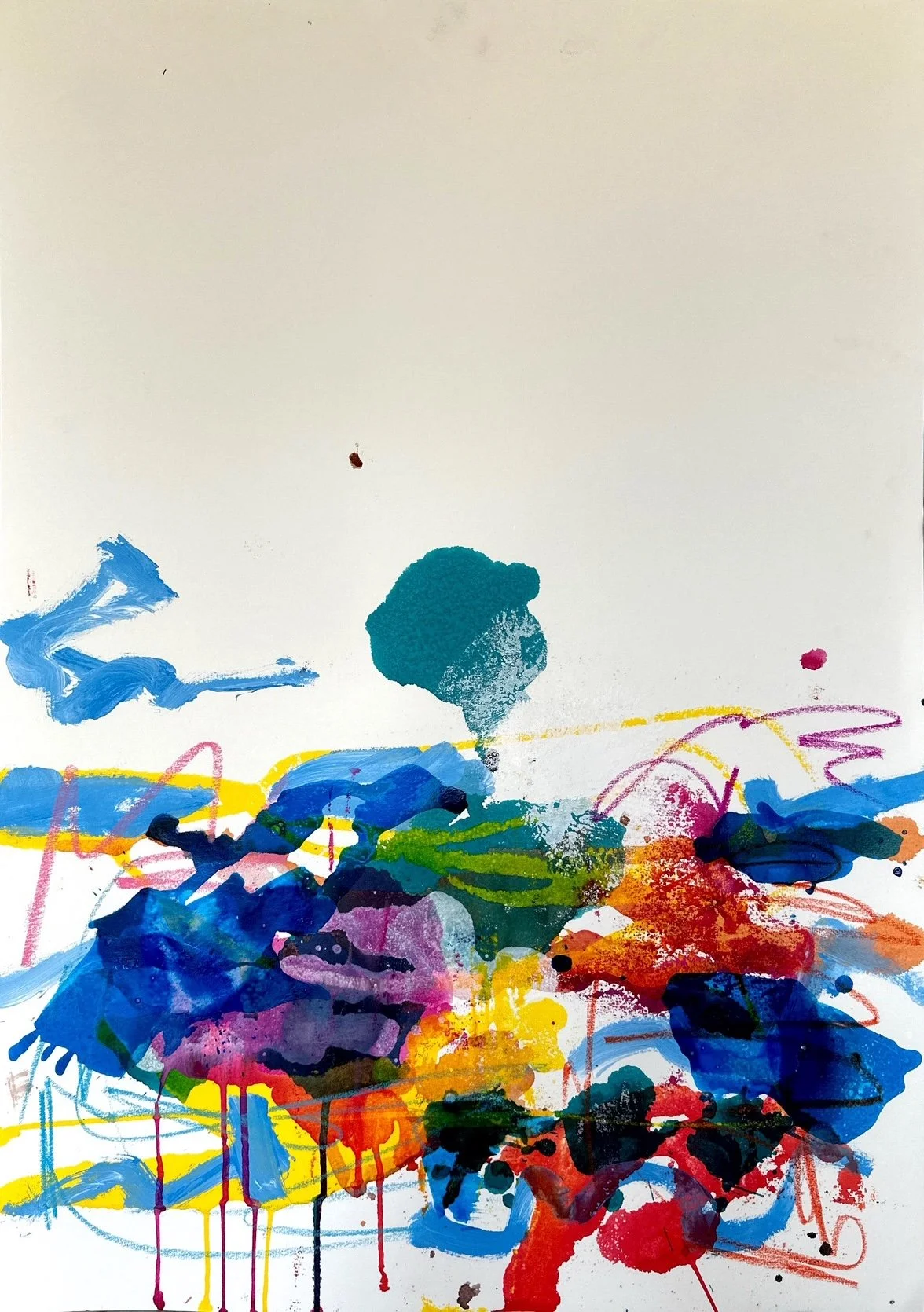 Abstract colorful paint splashes and lines on white paper.