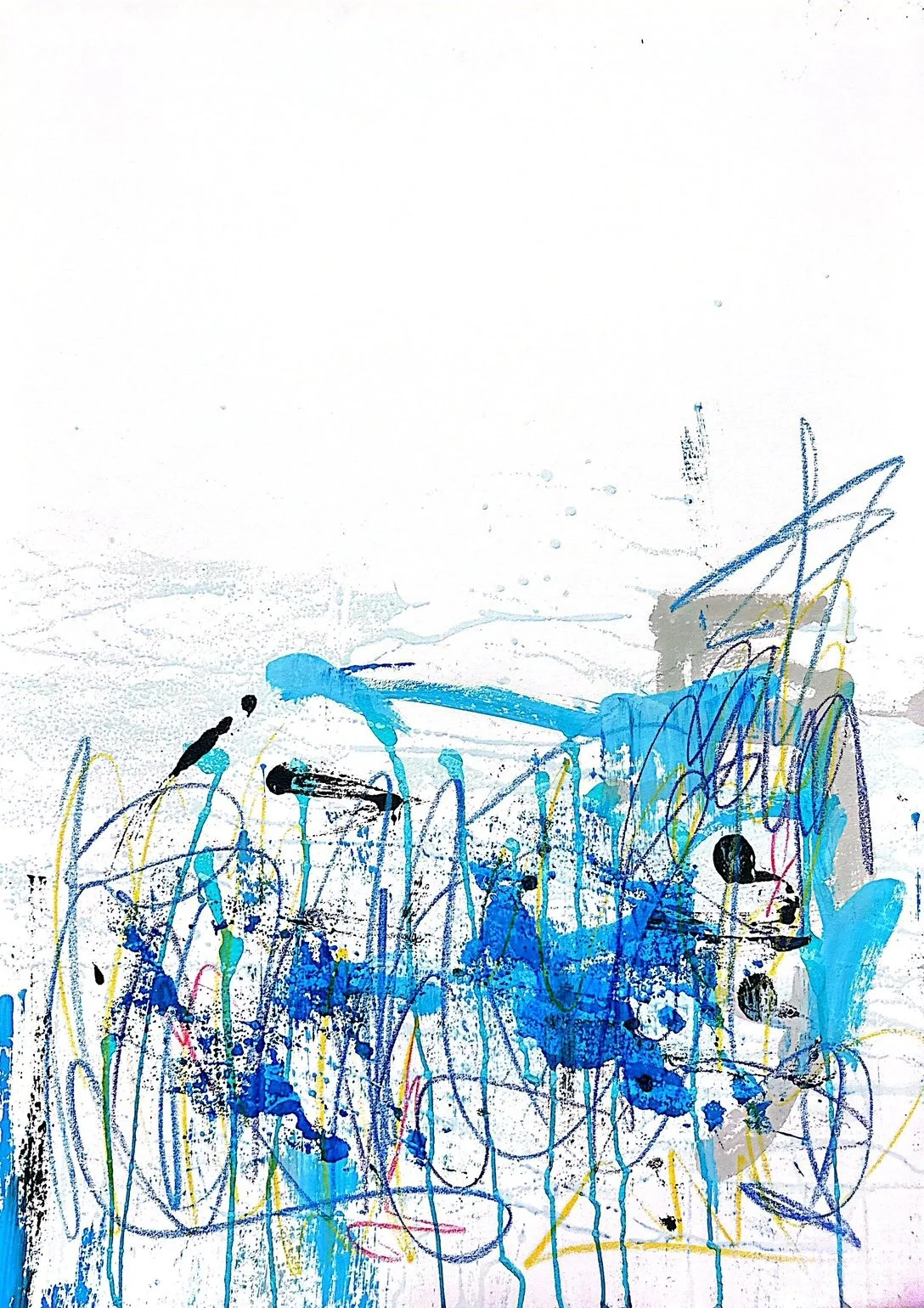 Child's abstract drawing with blue, yellow, black, gray, and purple crayon or marker scribbles and splashes on white paper.