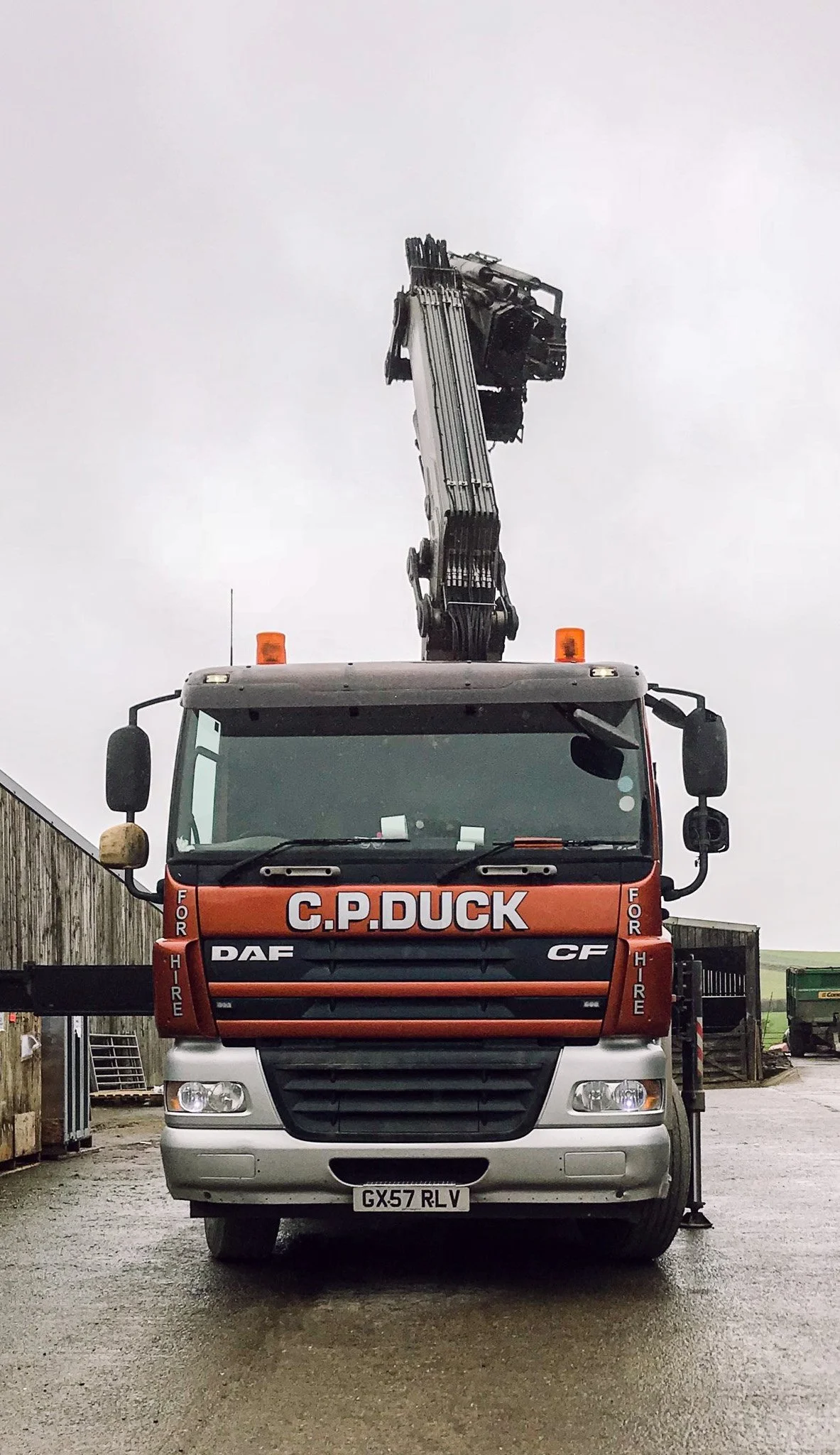 C.P. Duck Haulage FASSI crane lorry lifting load — specialist HIAB hire Somerset
