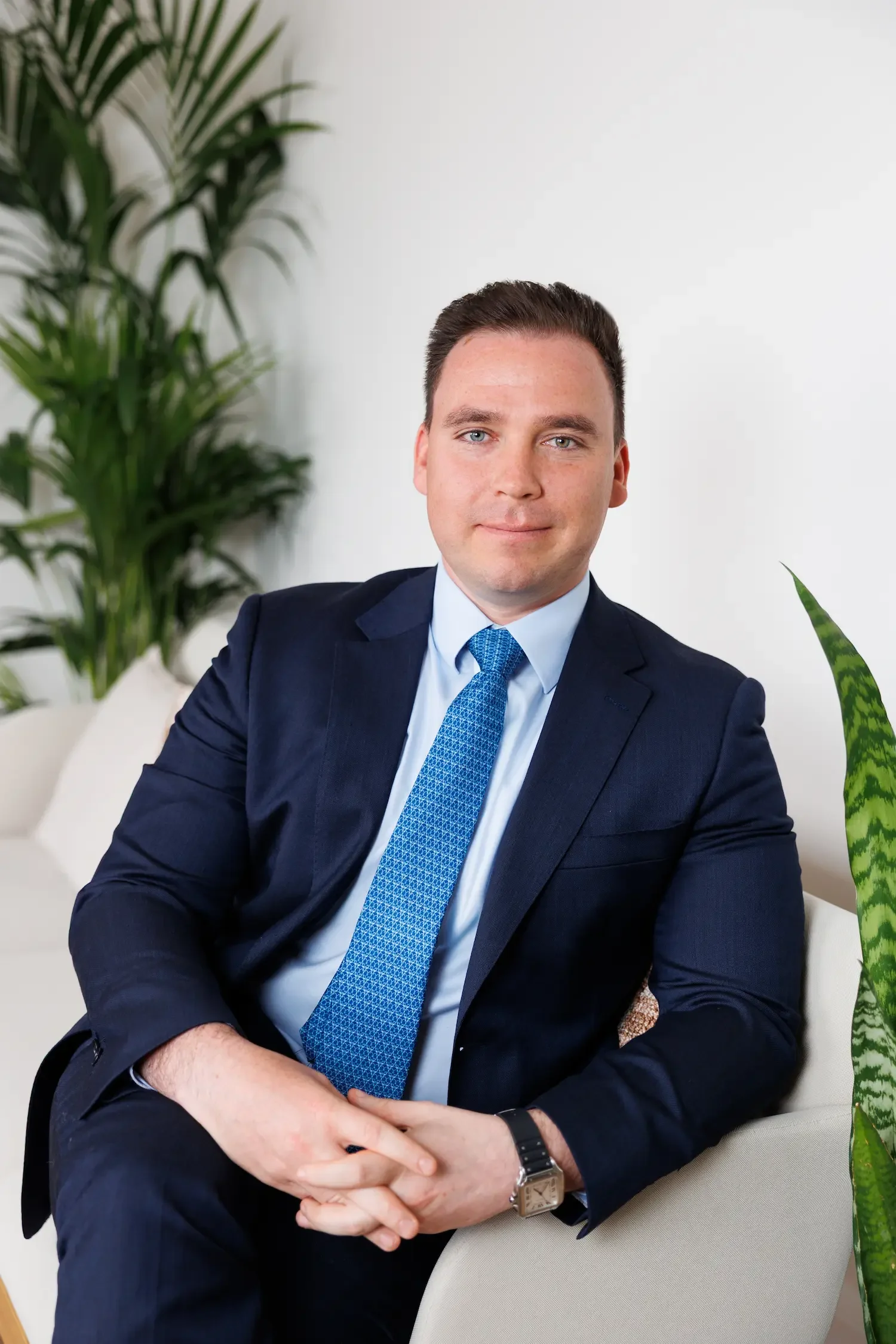 Managing Partner Benjamin Sampson ACA sitting on a sofa at Sampson Fielding chartered accountants in Central London