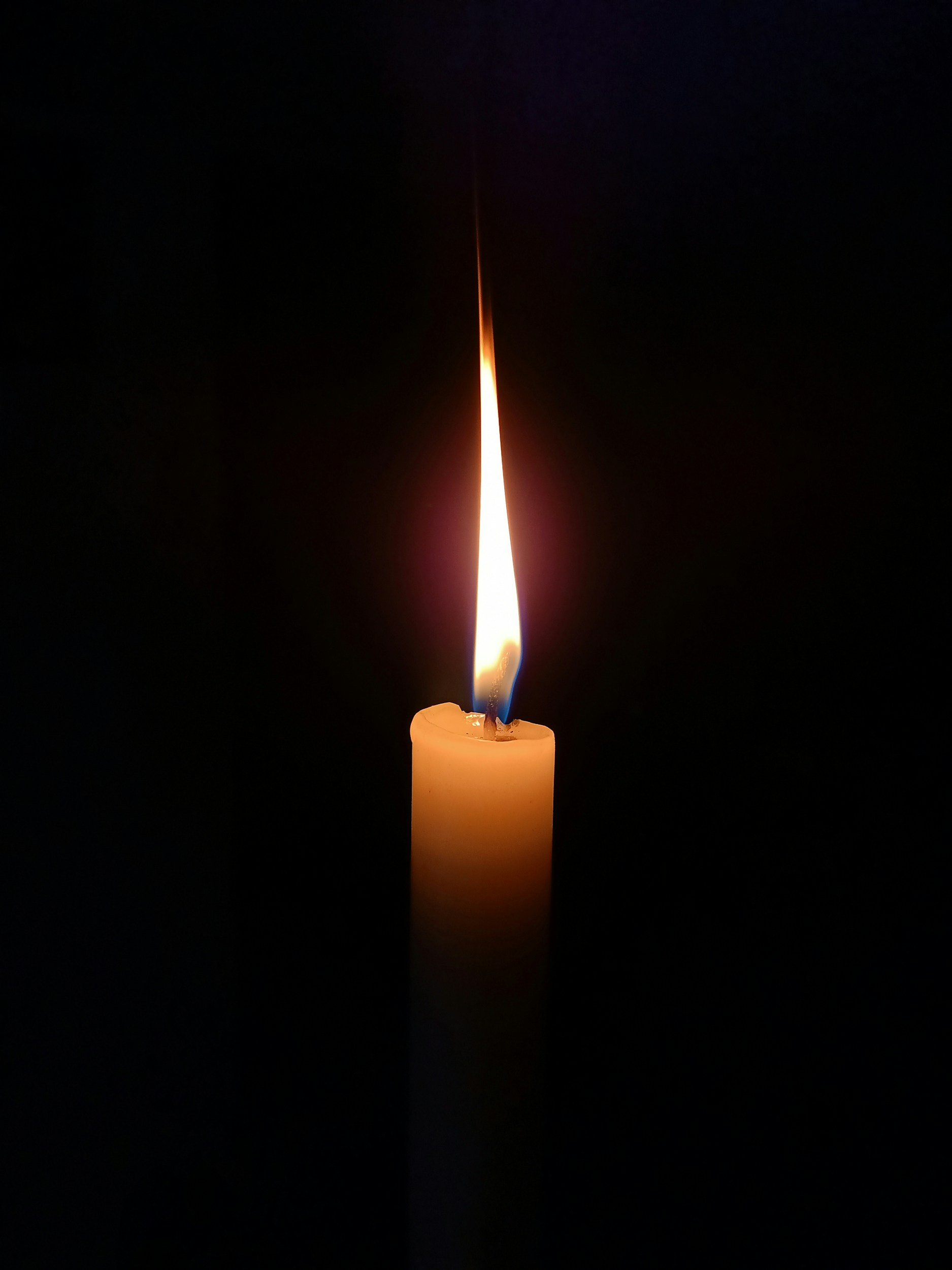 candle flame in dark background.