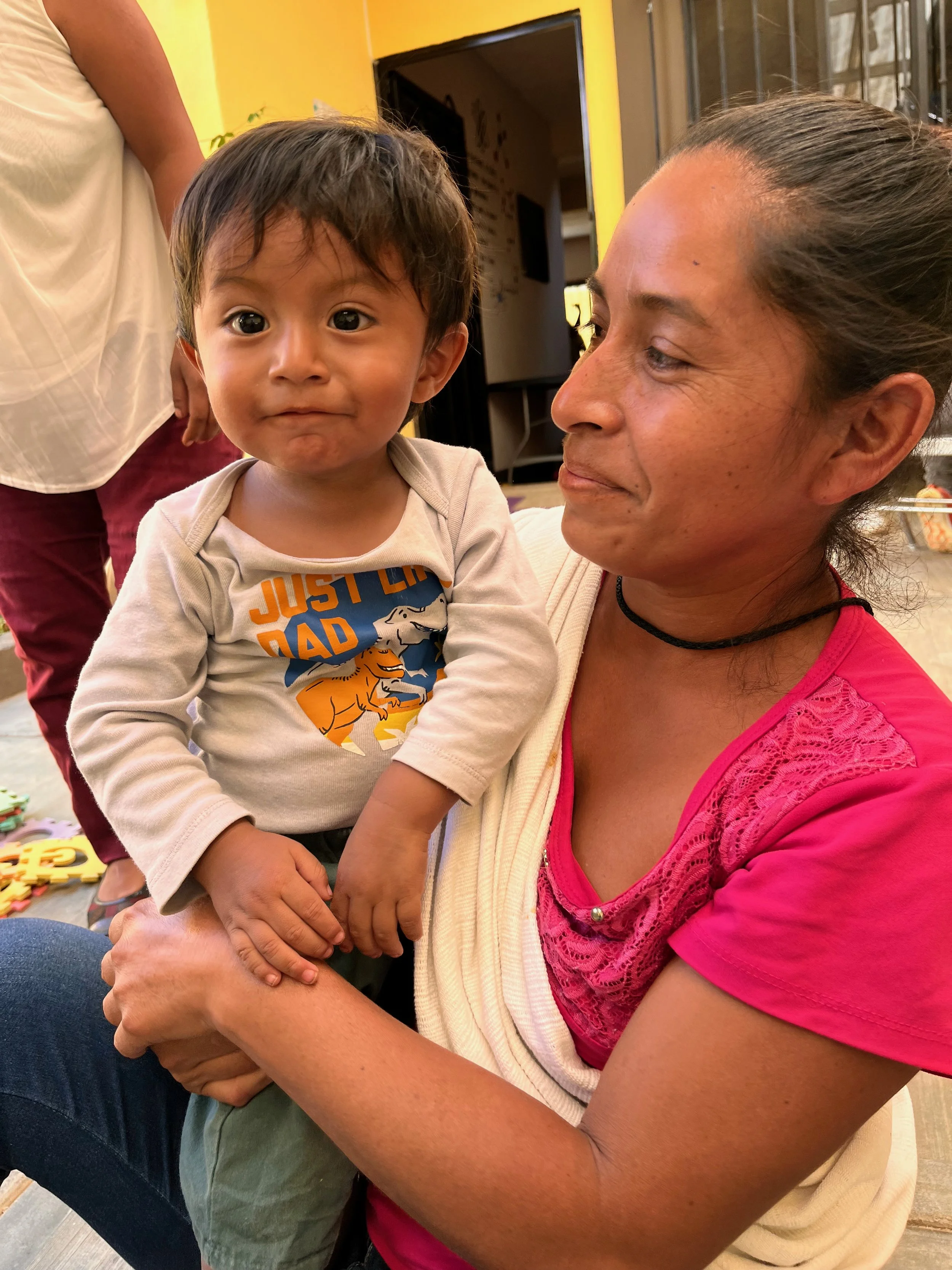 Mother and child embracing - demonstrating secure attachment and emotional connection. secure attachment, parent-child embrace, emotional bonding